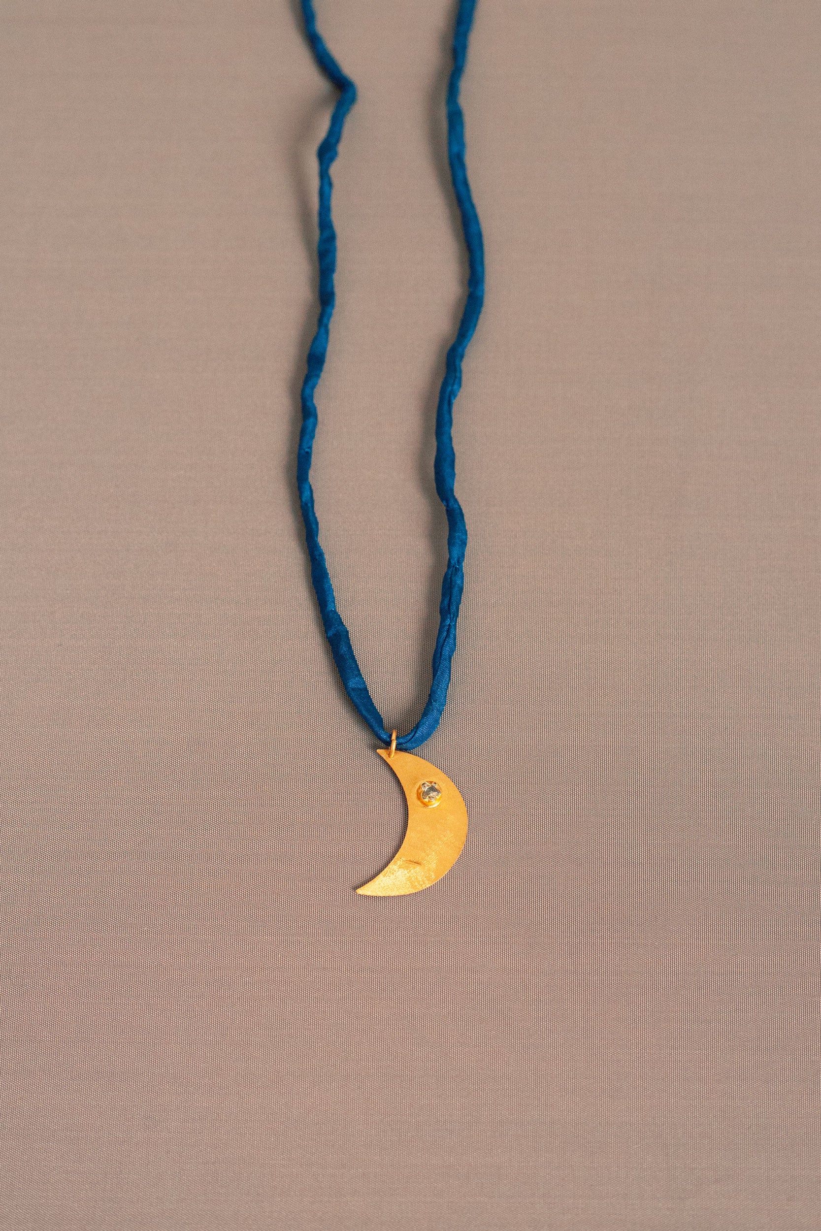 Aku gold silk necklace