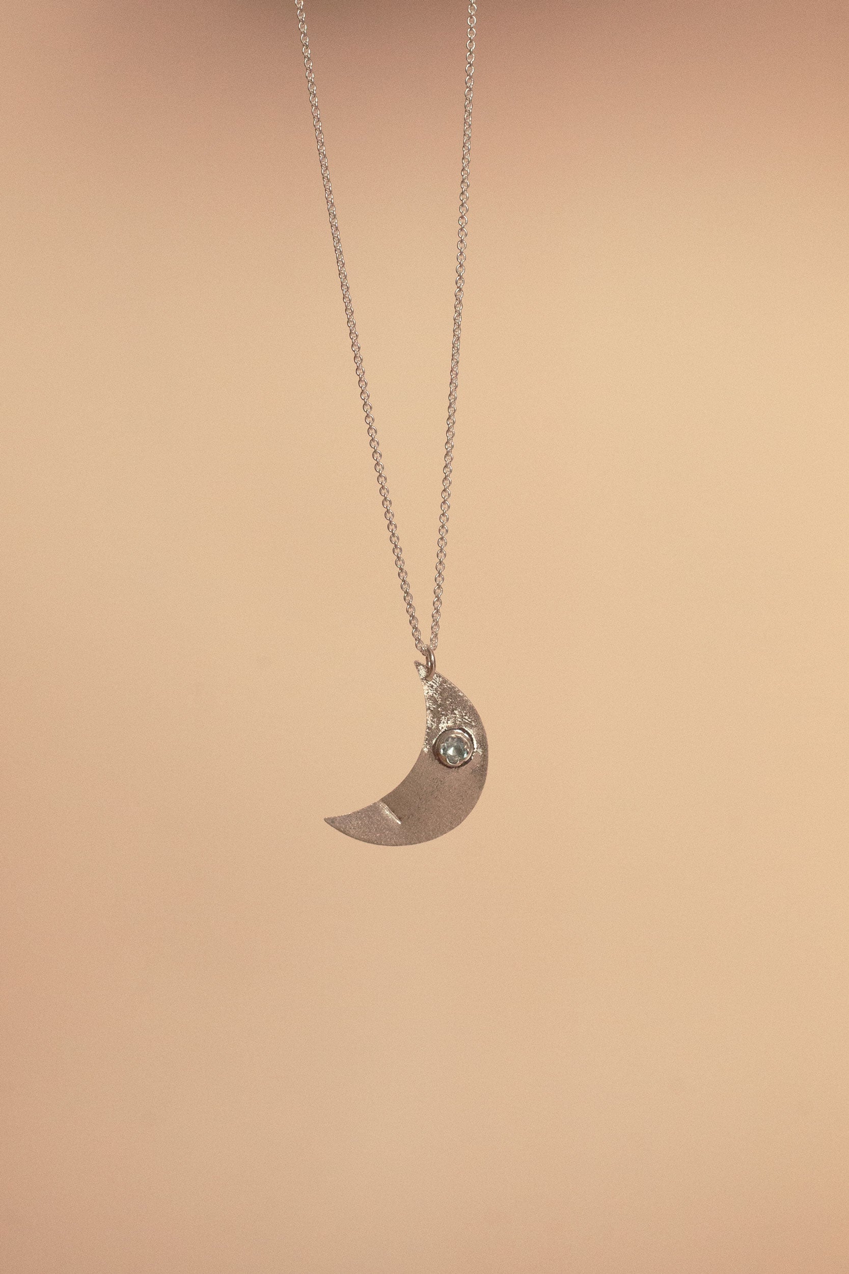 Aku silver pendant