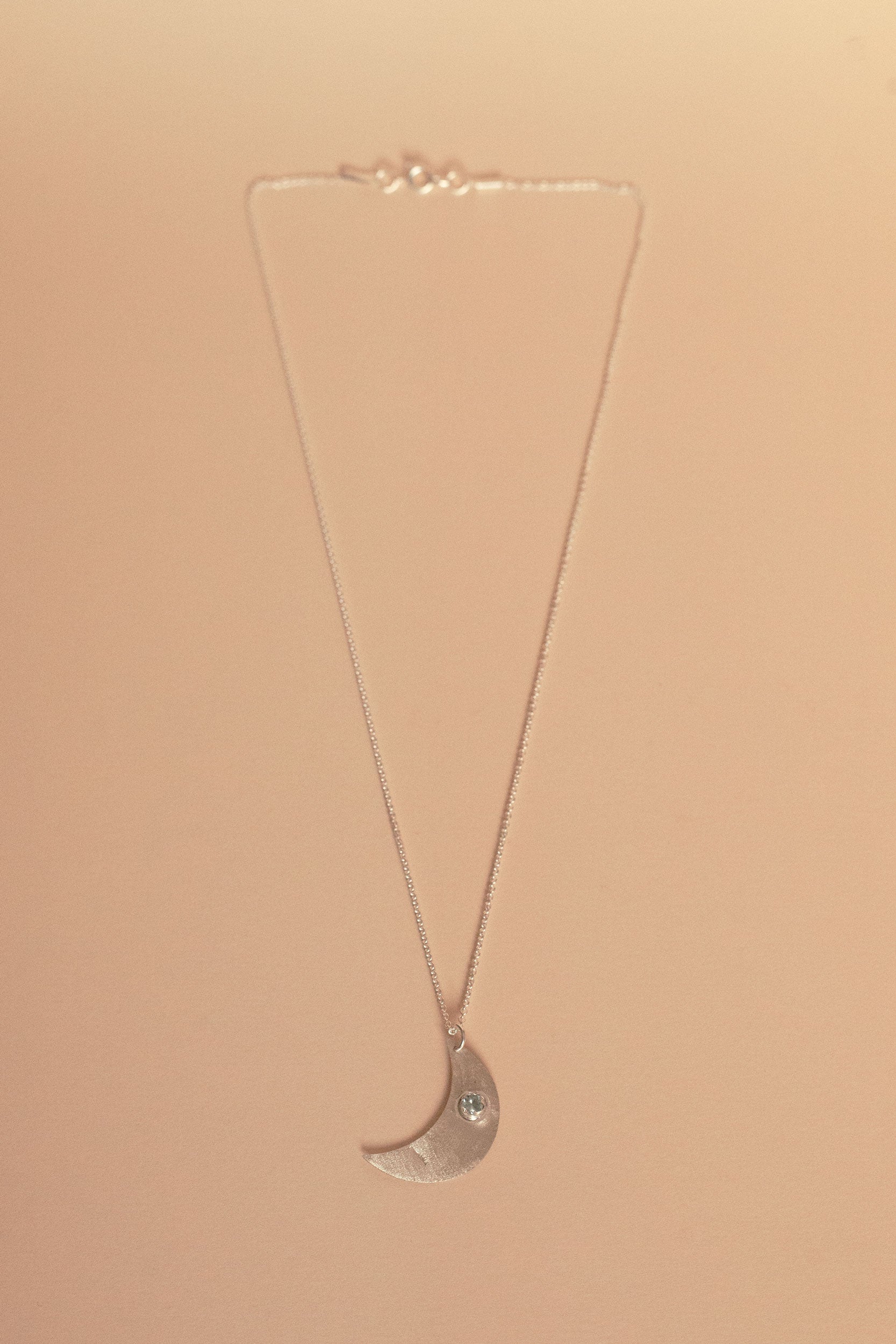 Aku silver pendant