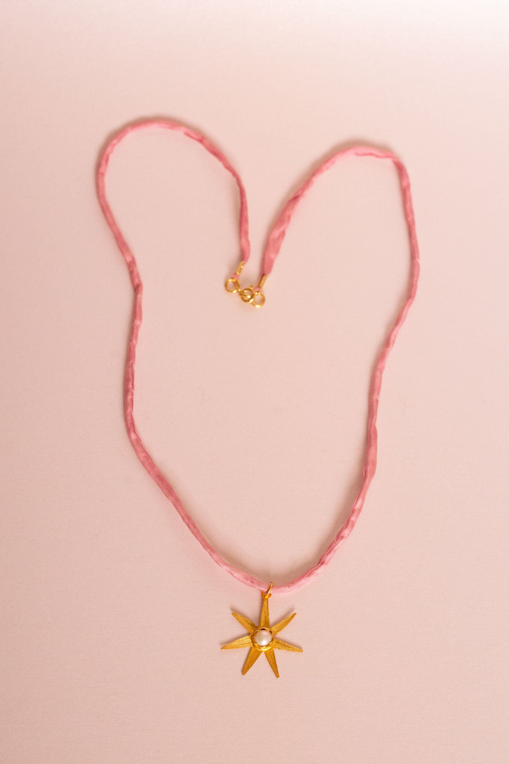 Atlas gold silk necklace