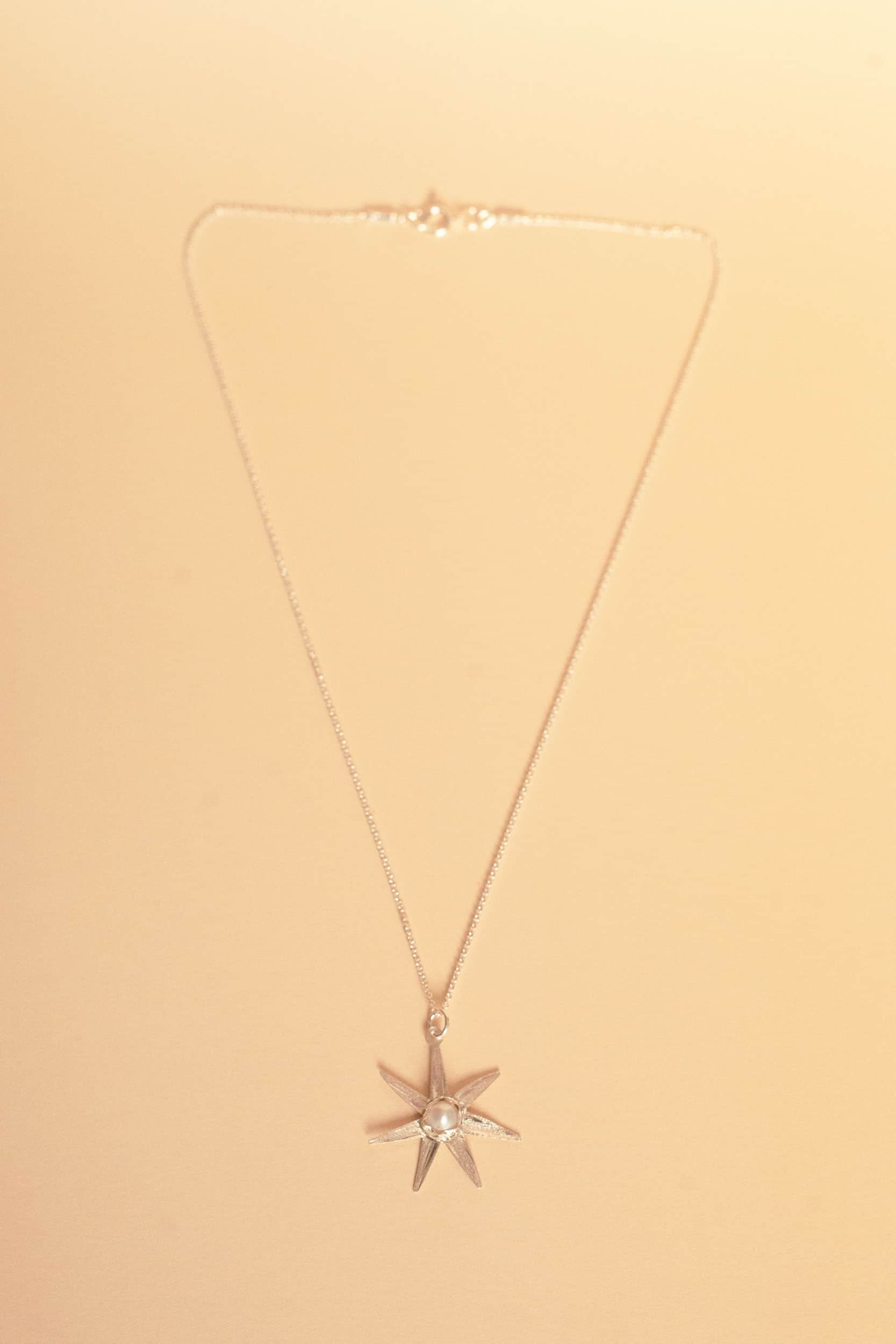 Atlas silver pendant