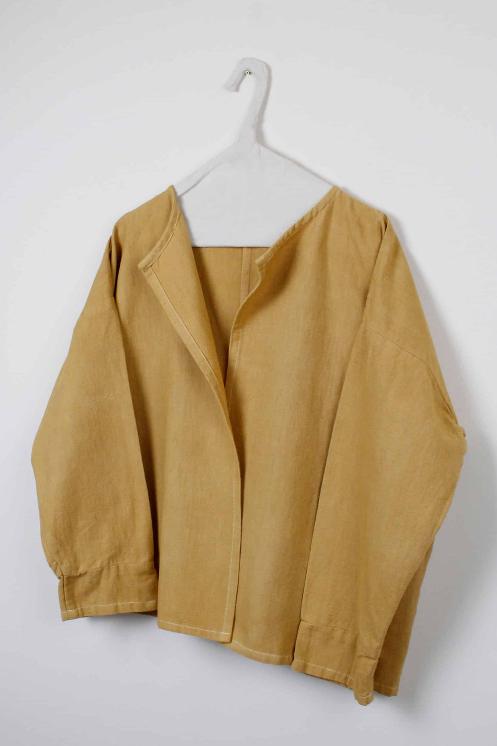 Yellow dyed buttonless jacket