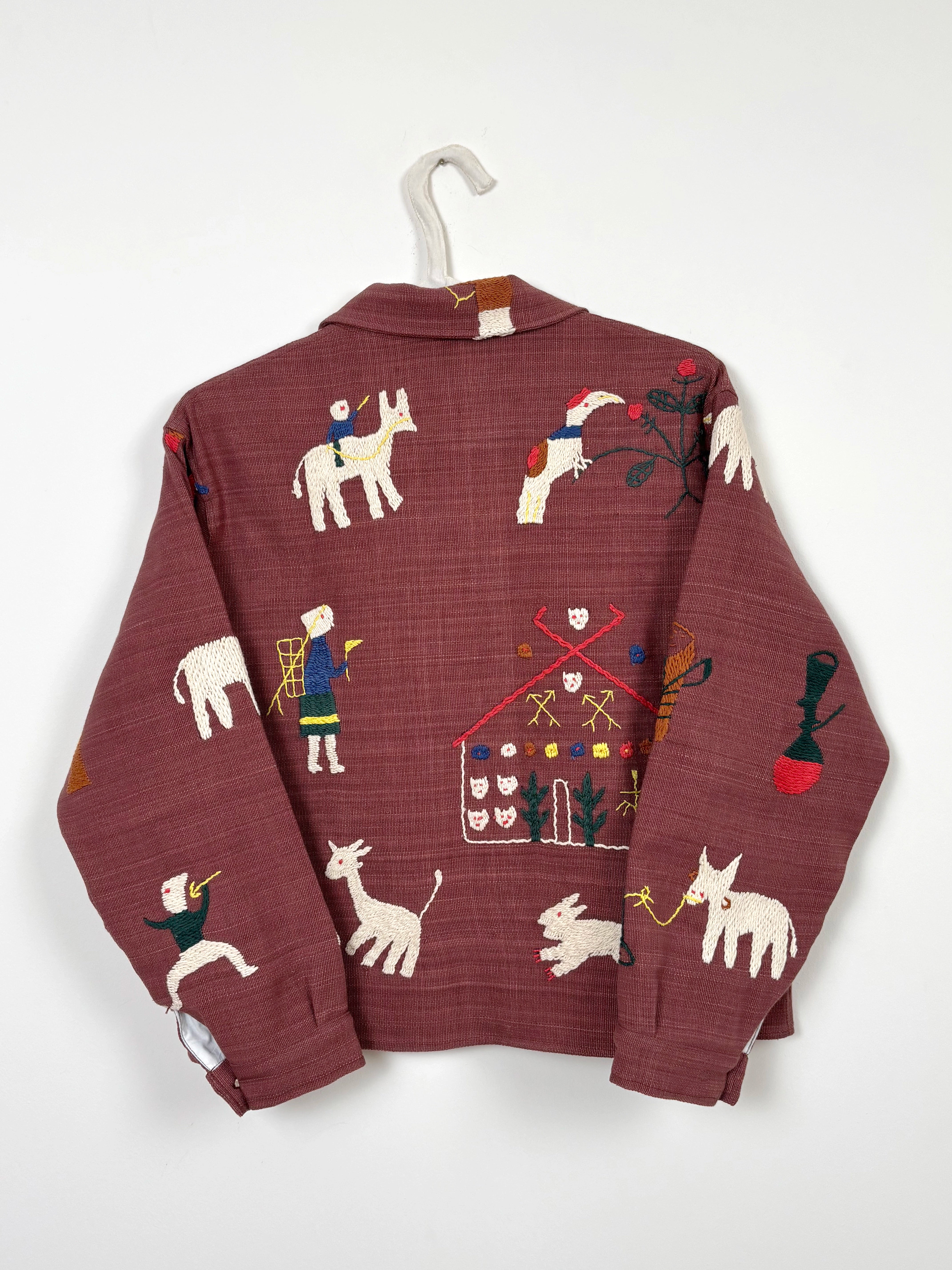 Children on donkeys scene jacket