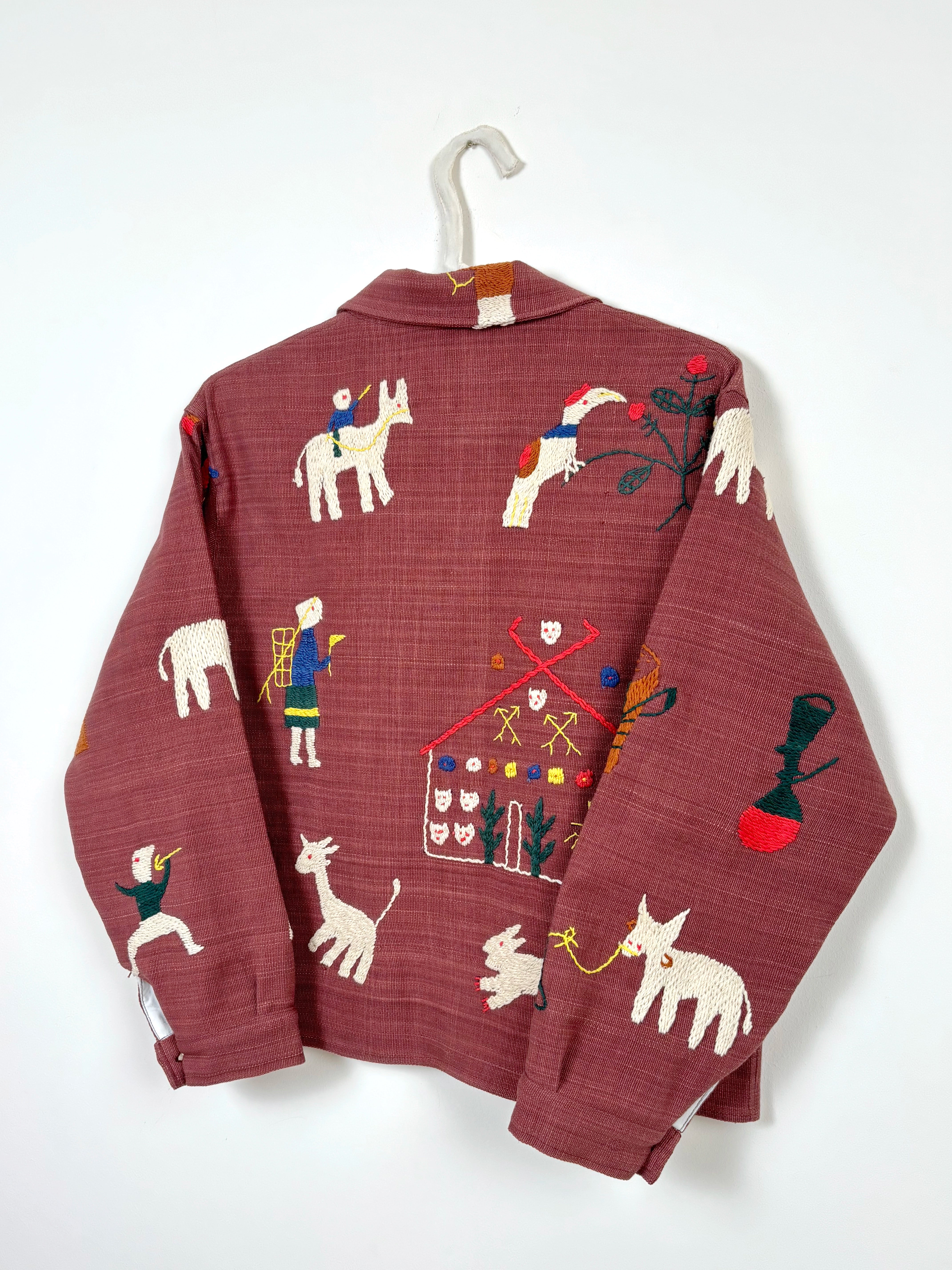 Children on donkeys scene jacket
