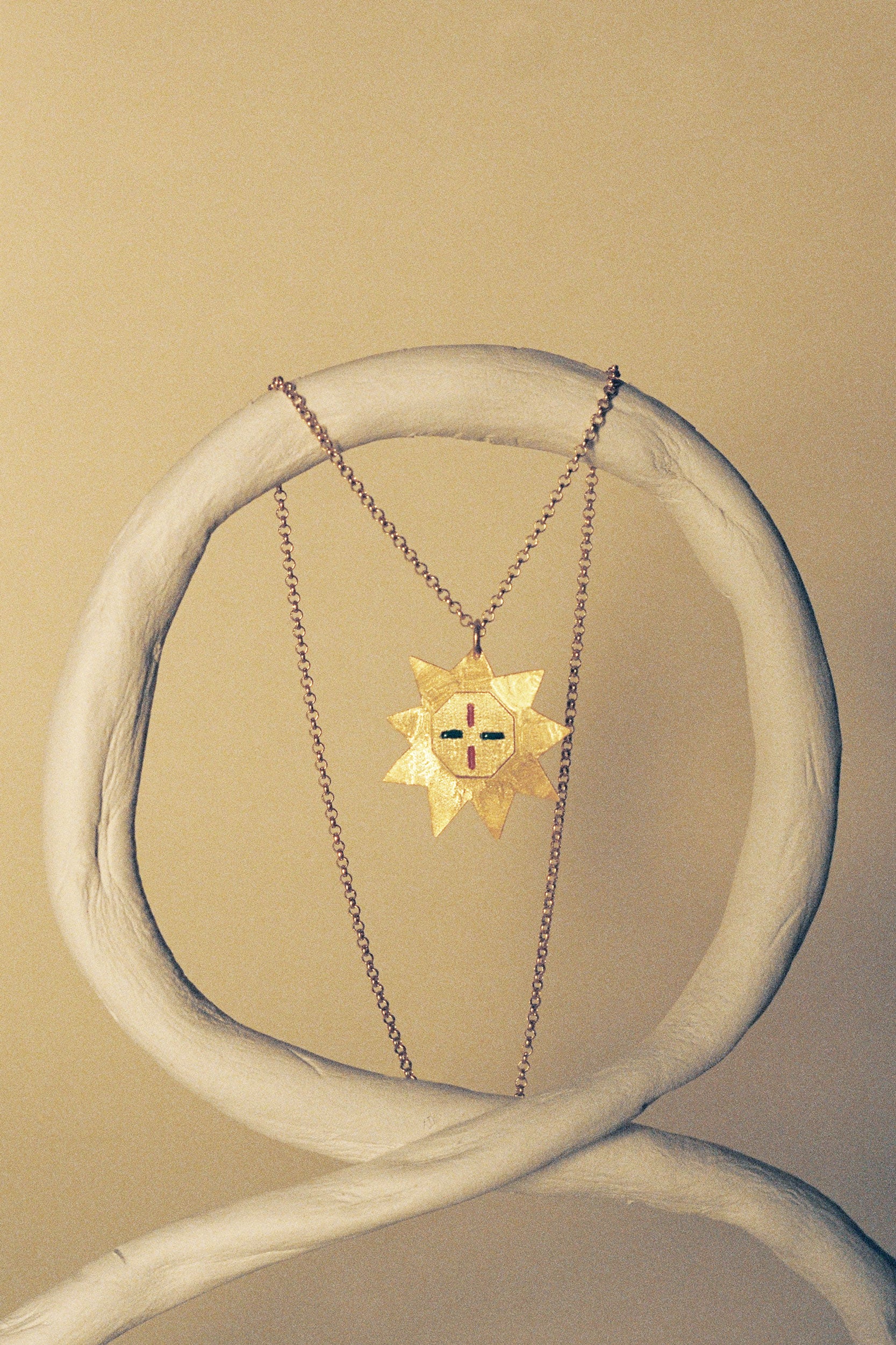 Inti pendant