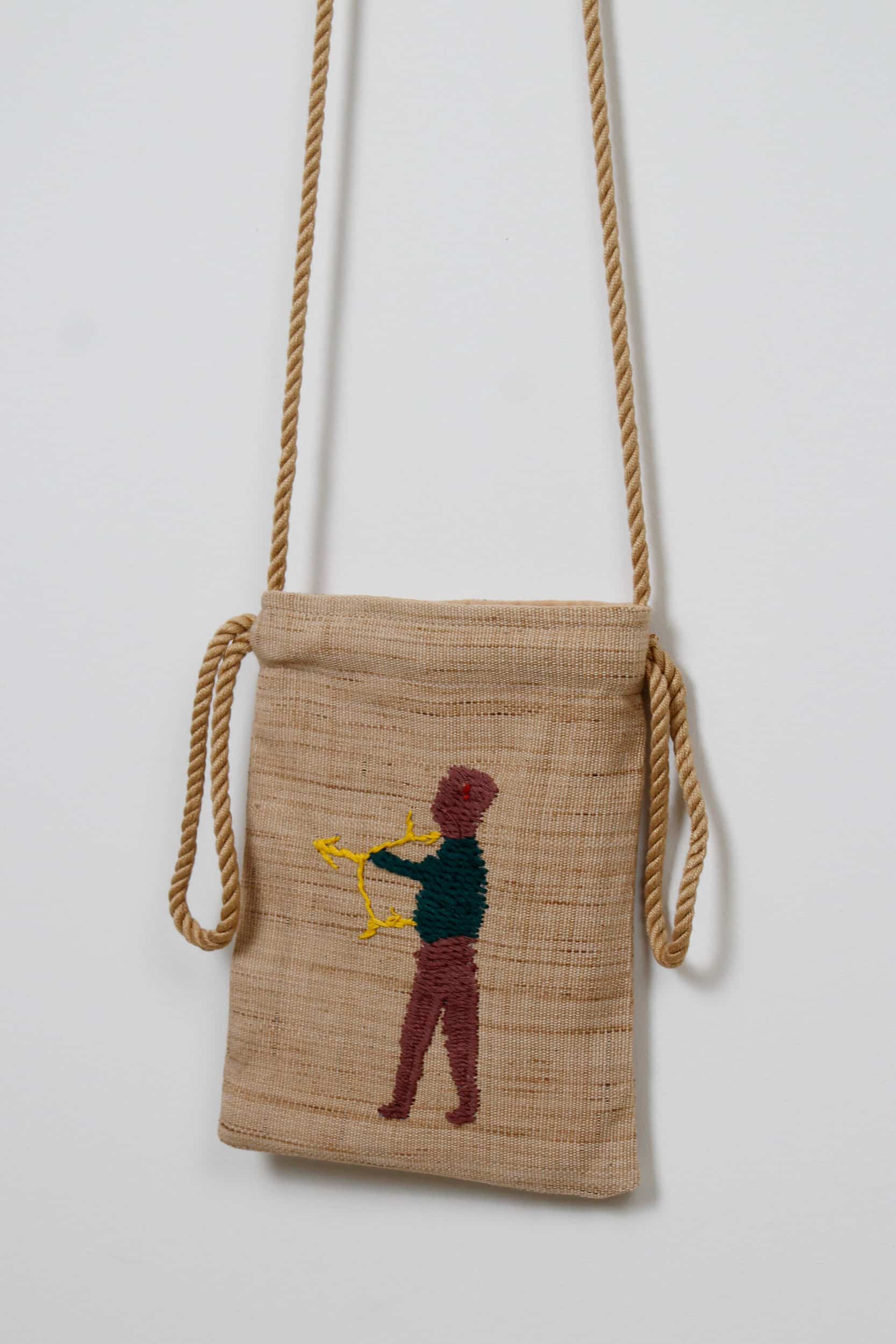 An archer scene pouch bag