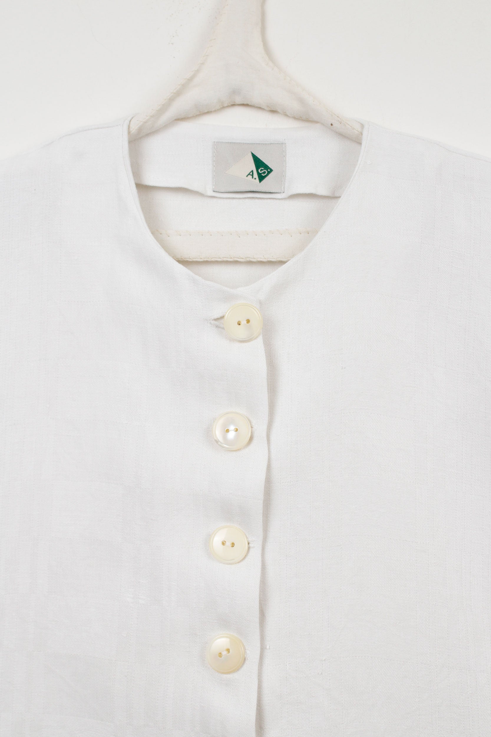 White linen short jacket