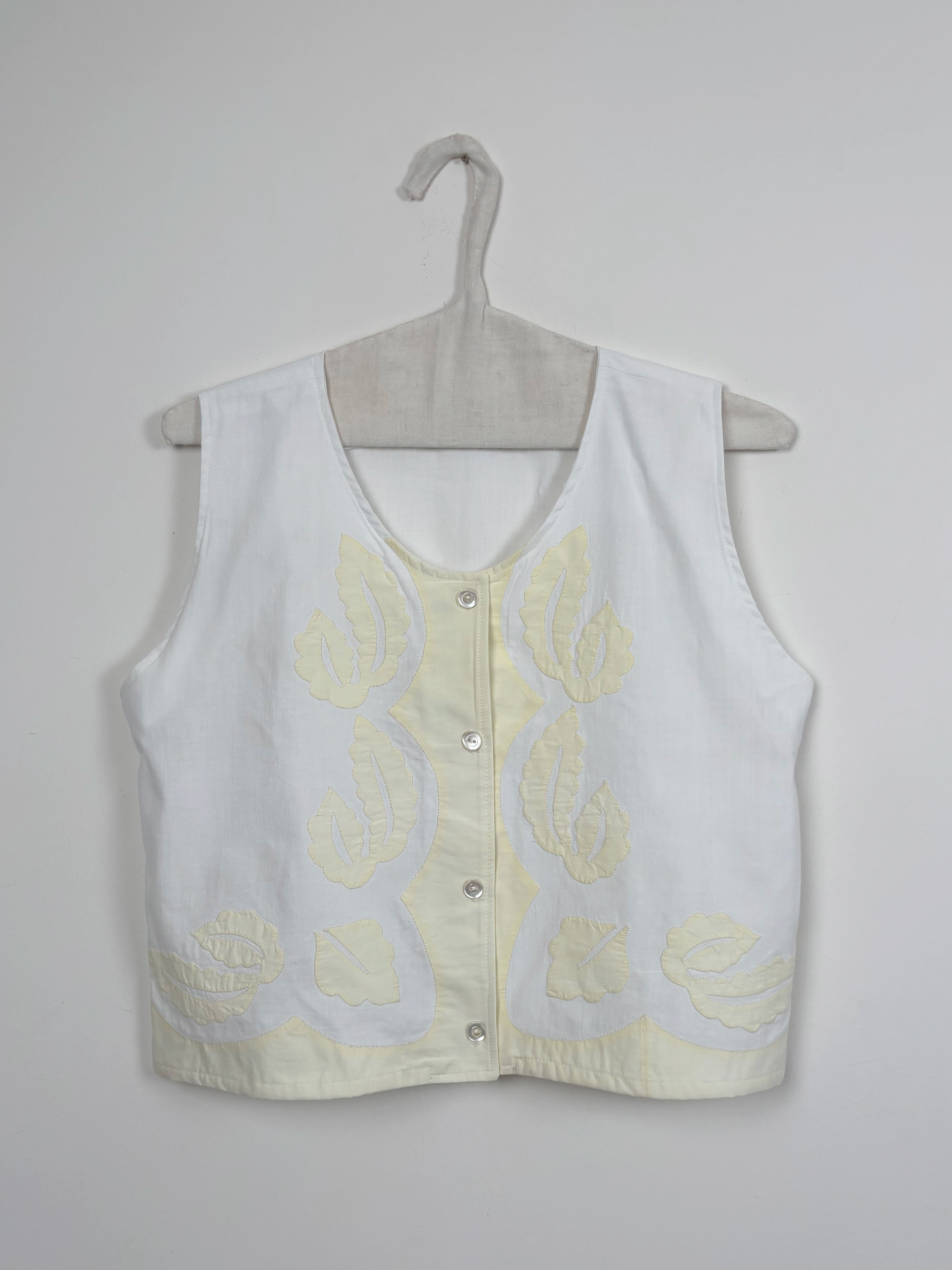 Yellow flowers sleeveless shirt