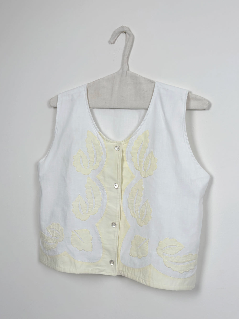Yellow flowers sleeveless shirt