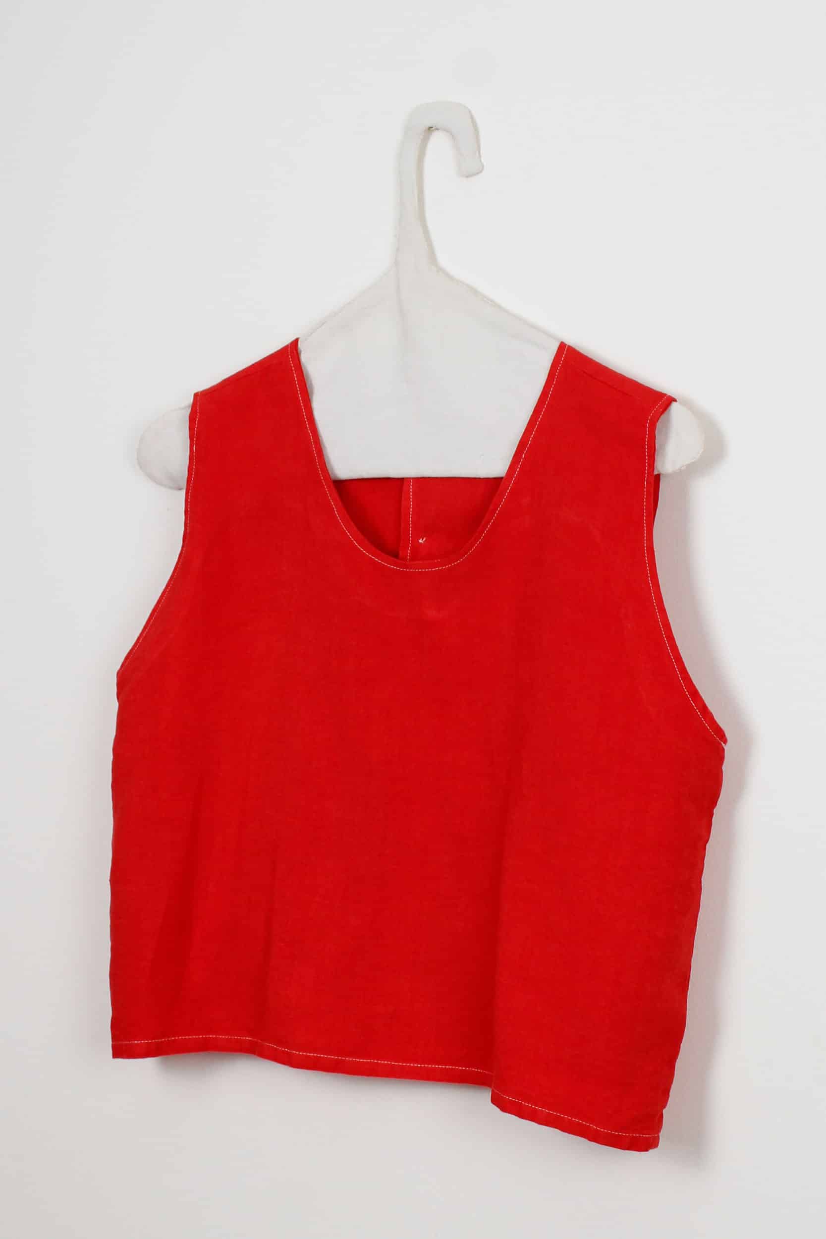 Red dyed back buttons top