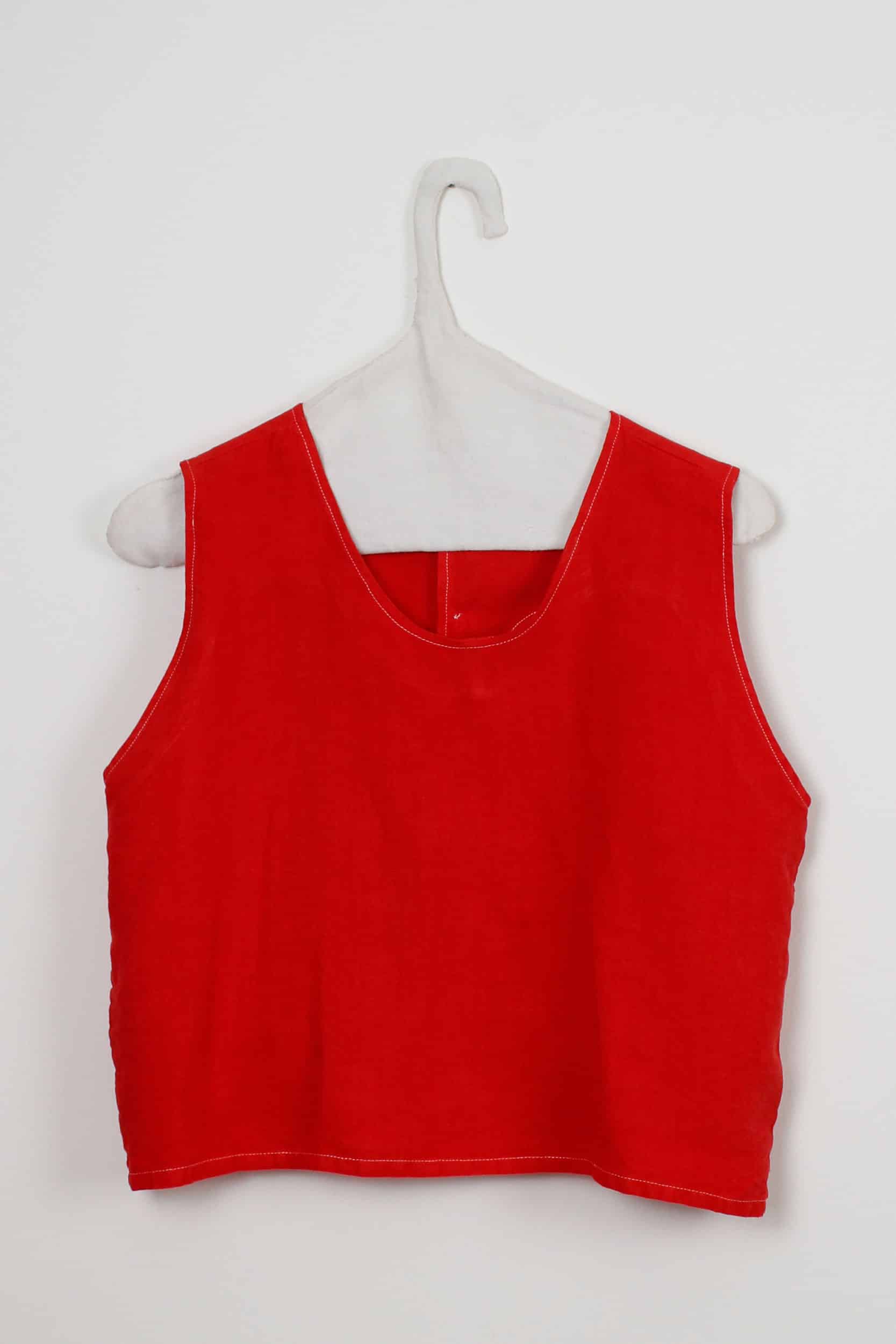 Red dyed back buttons top