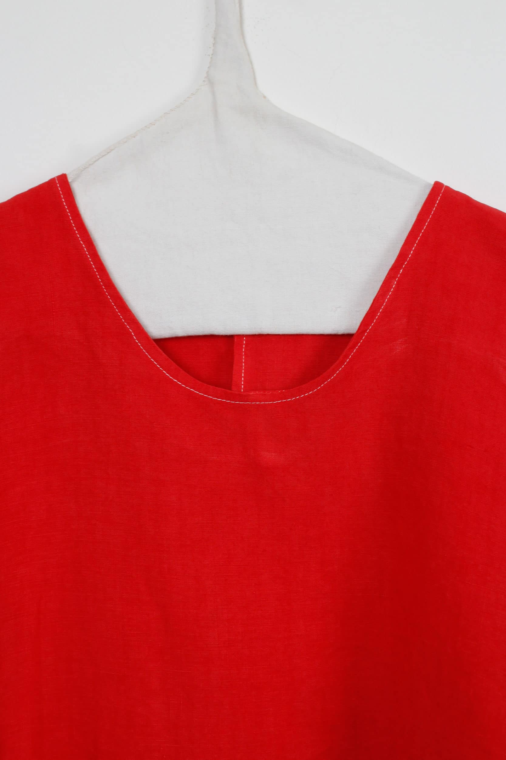 Red dyed back buttons top