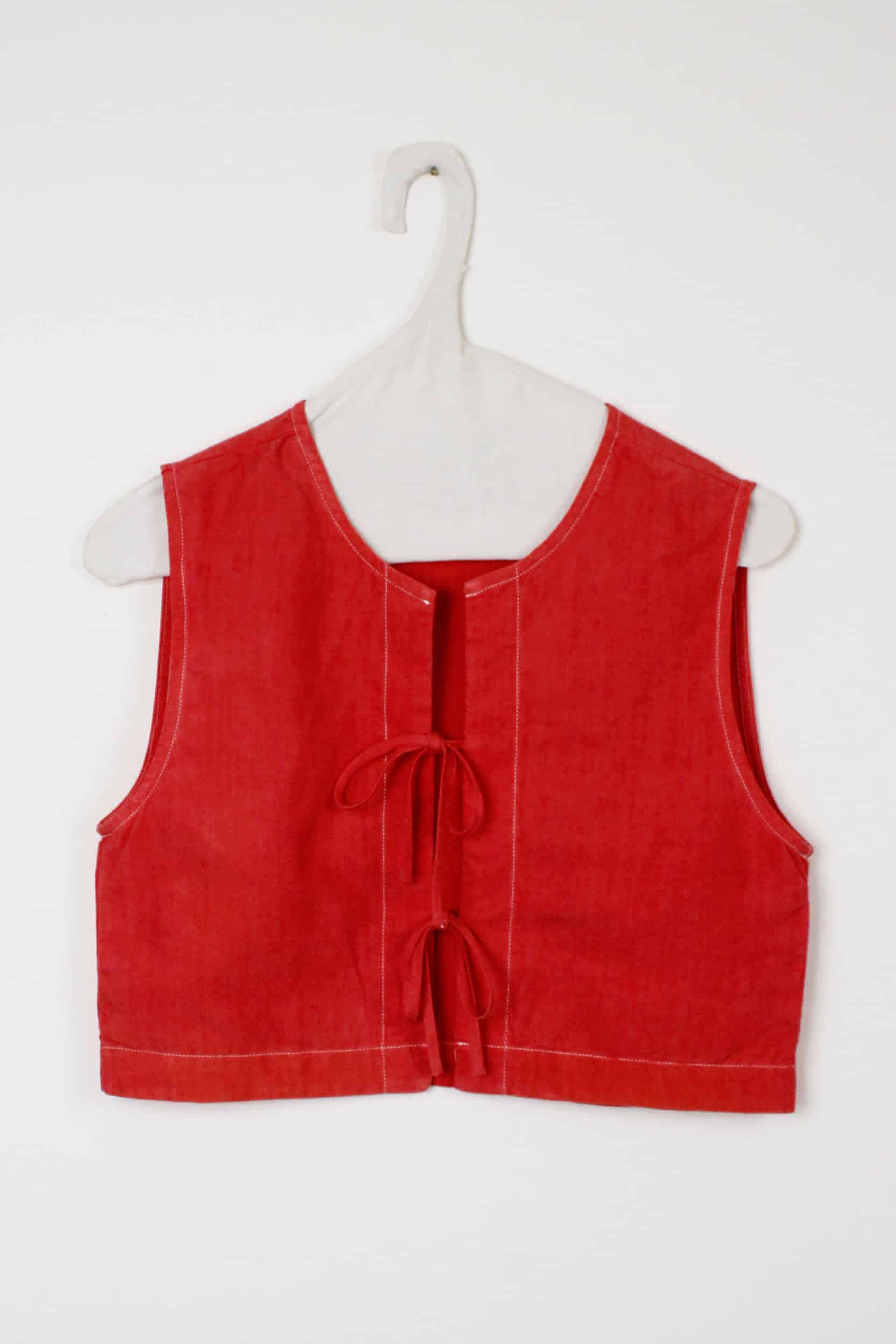 Red dyed top with bows