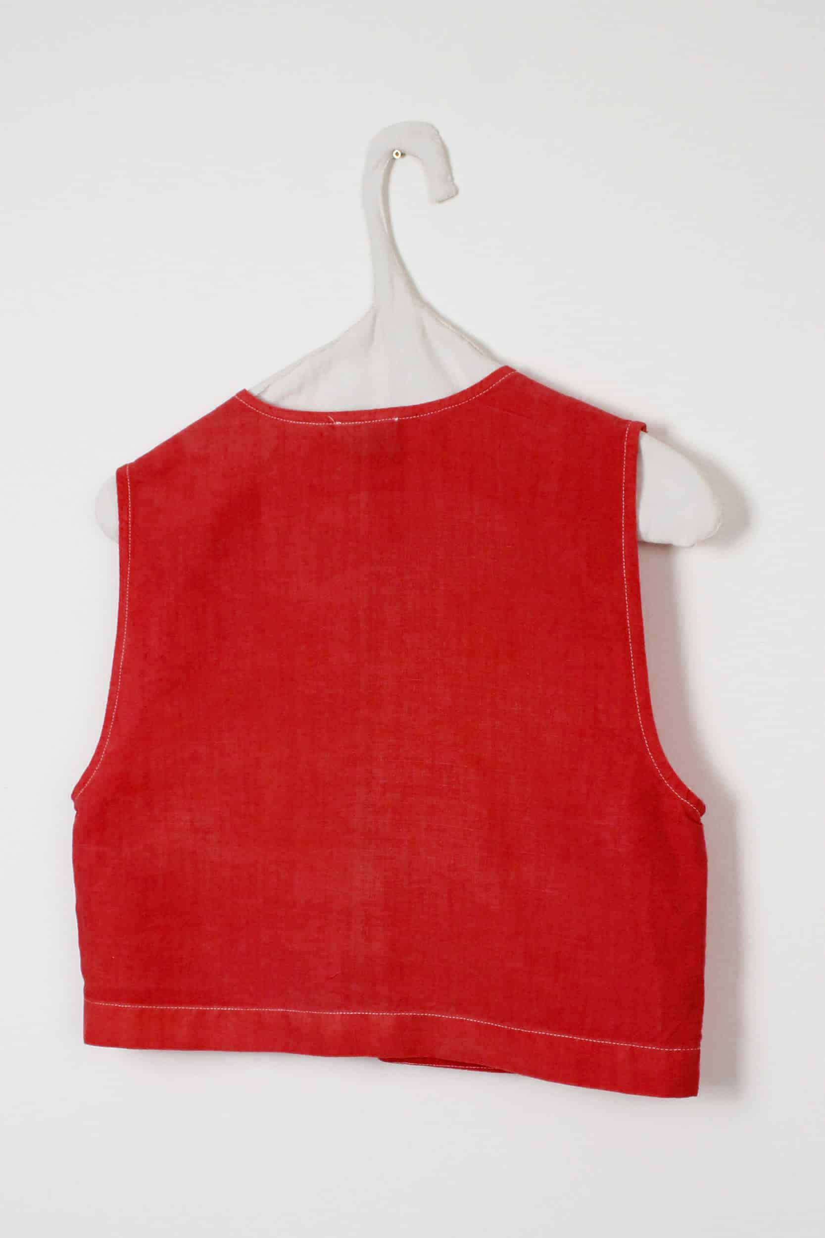 Red dyed top with bows