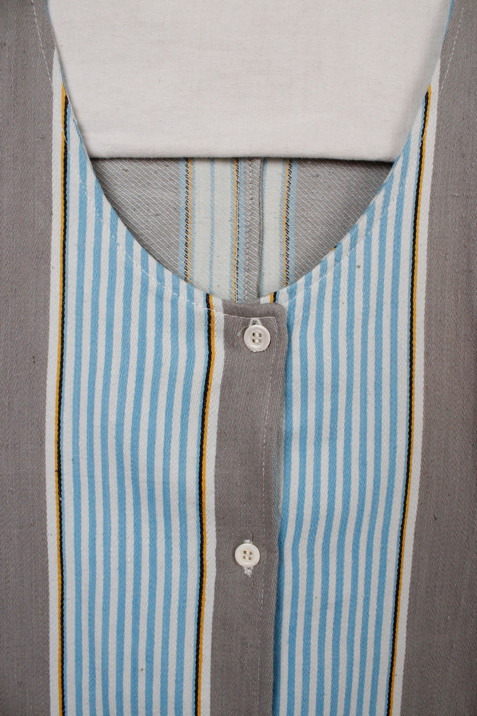Sky-blue and grey stripes sleeveless shirt