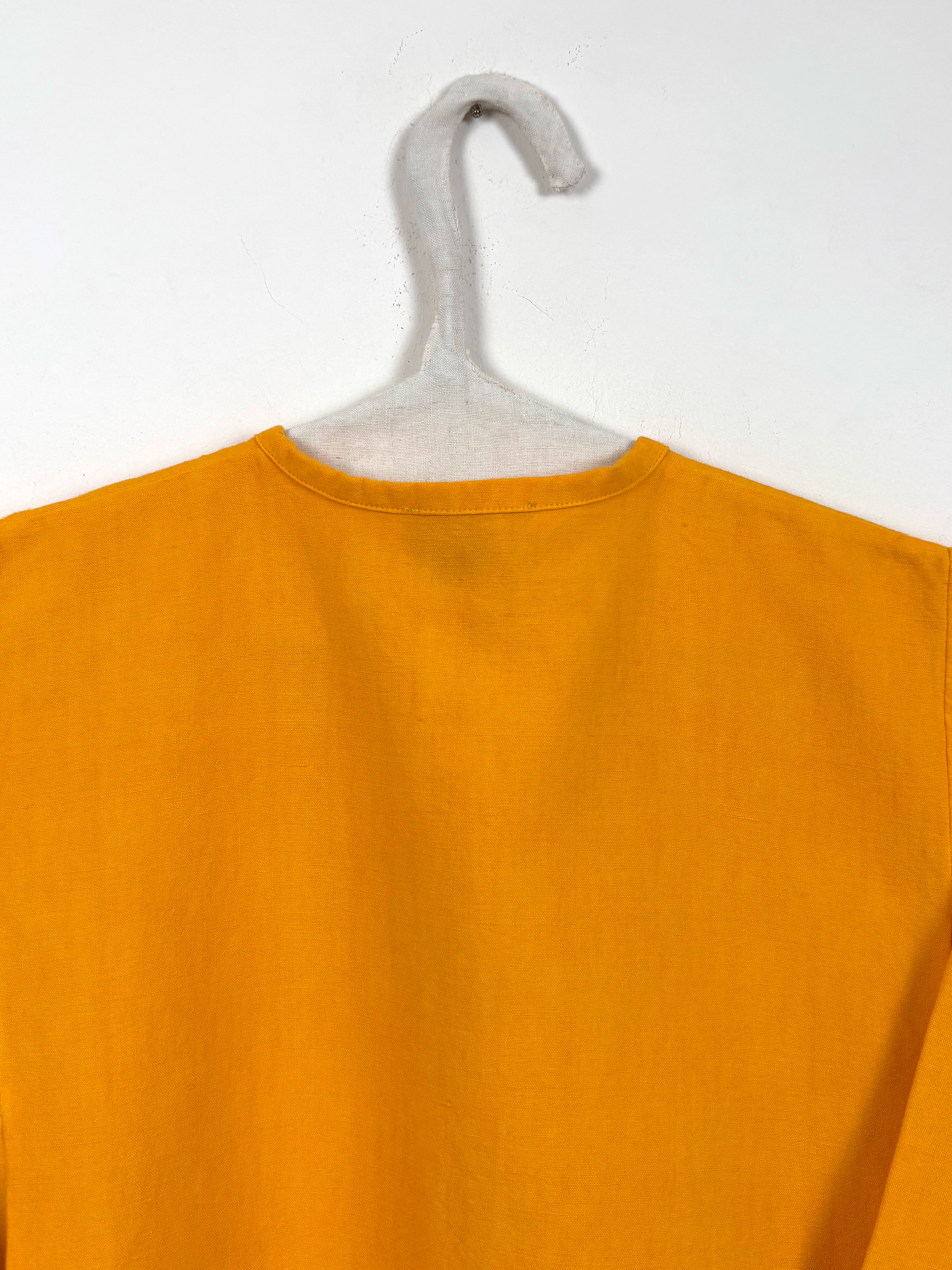Vibrant yellow dyed tunic
