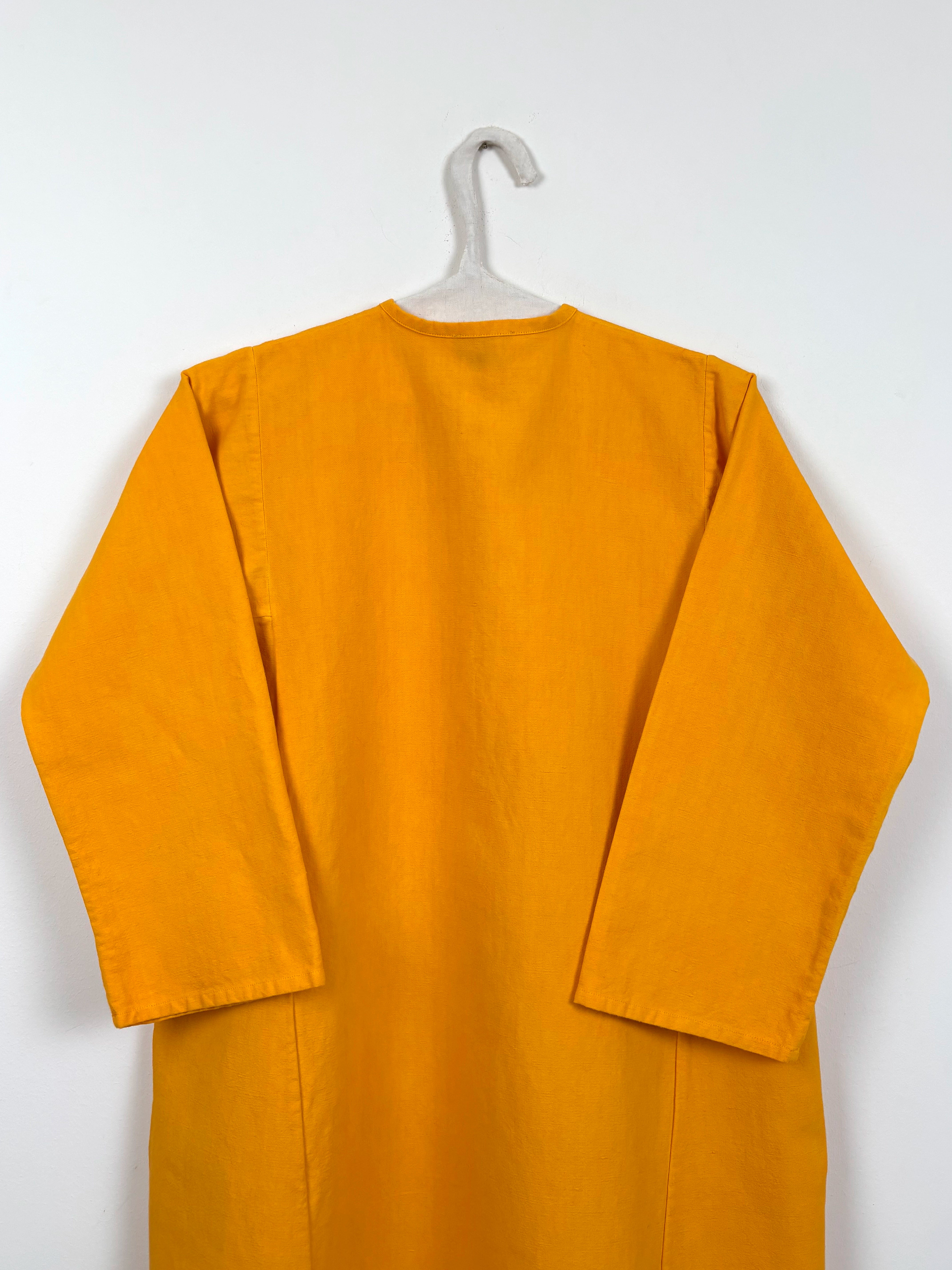Vibrant yellow dyed tunic