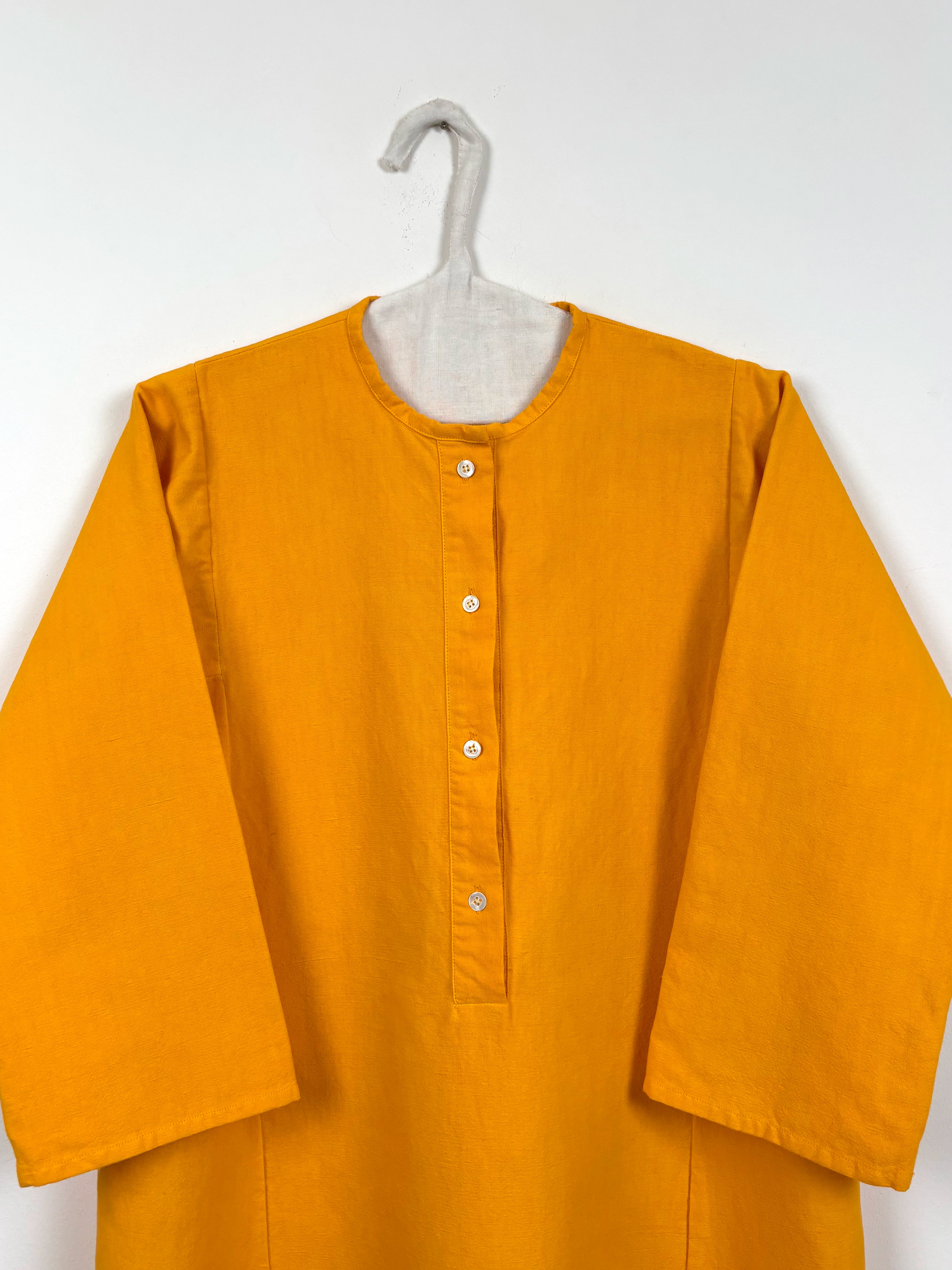 Vibrant yellow dyed tunic