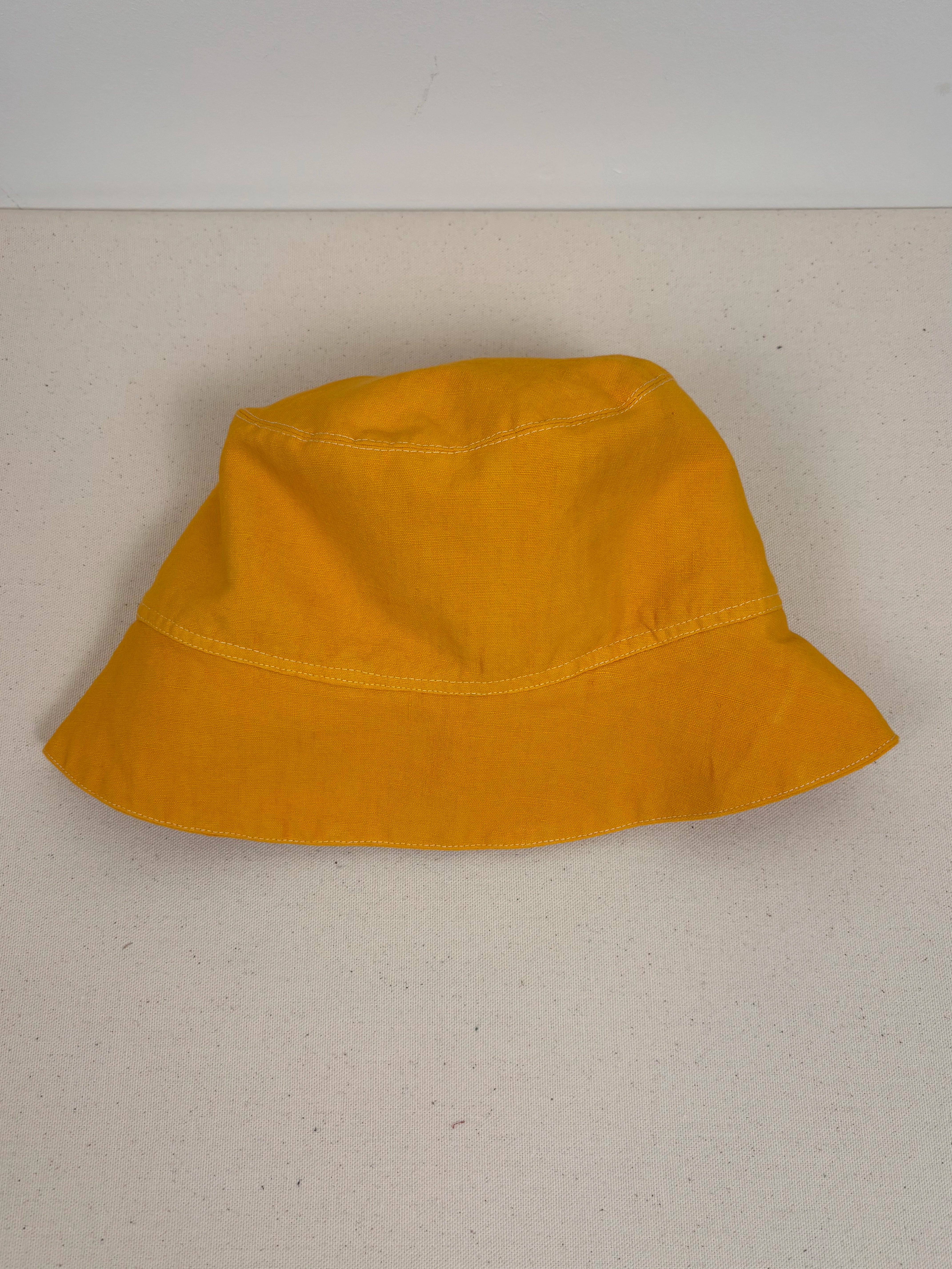 Vibrant yellow dyed wide-brimmed hat