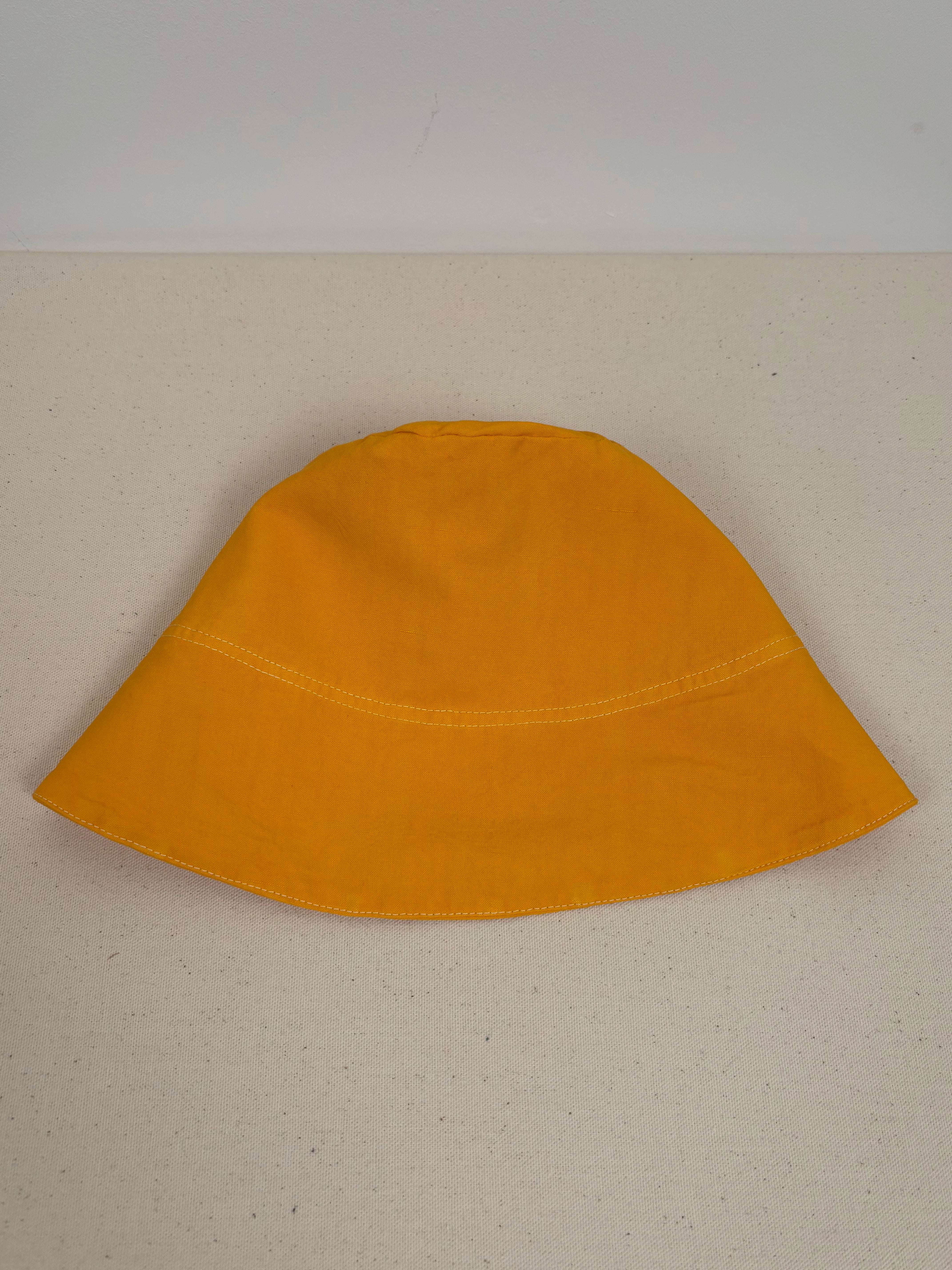 Vibrant yellow dyed bucket hat