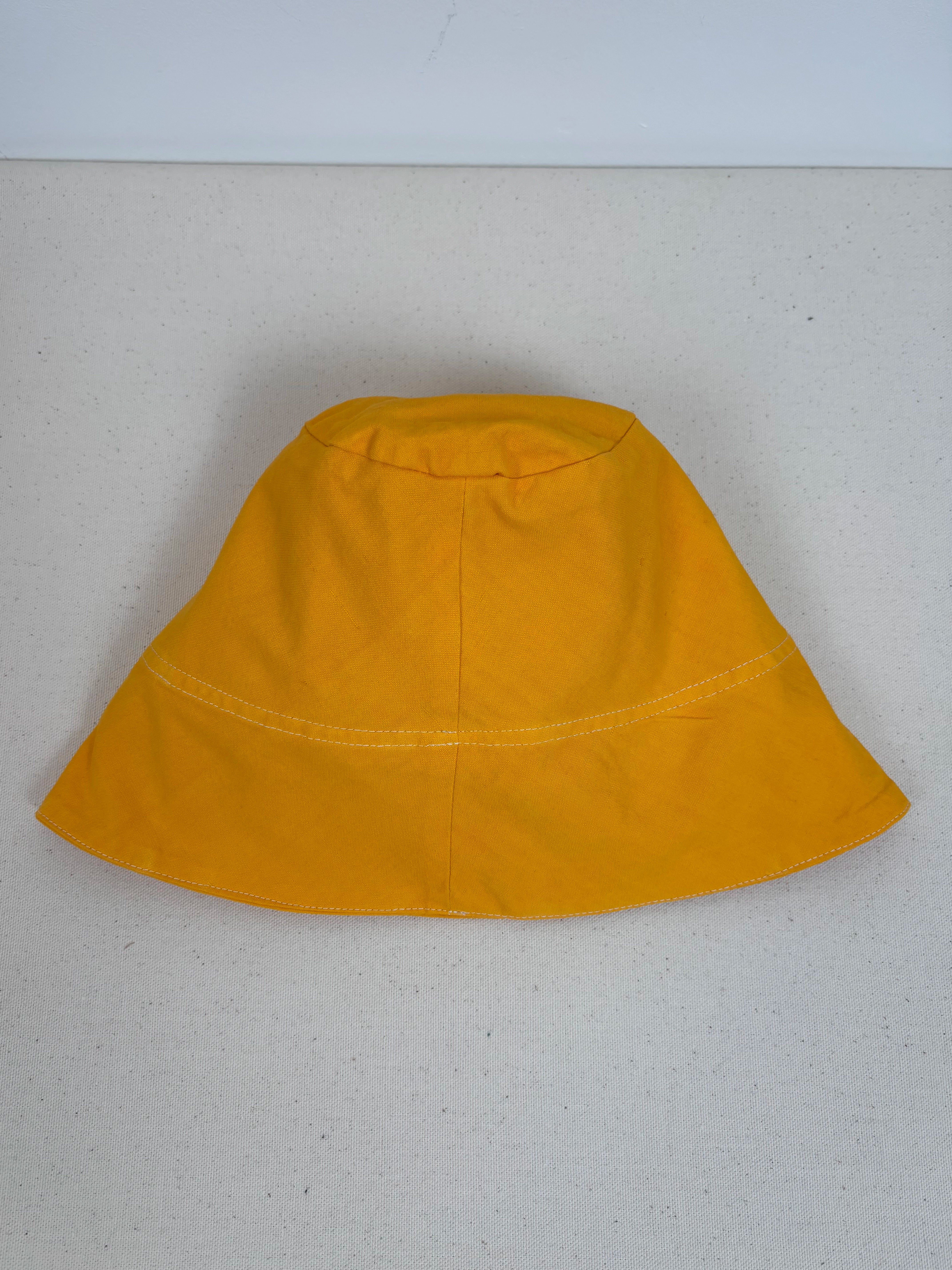 Vibrant yellow dyed bucket hat