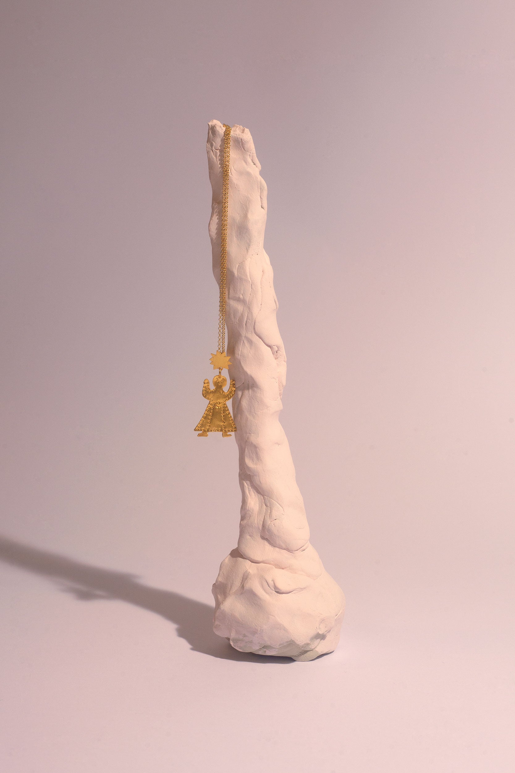 Tête de soleil pendant