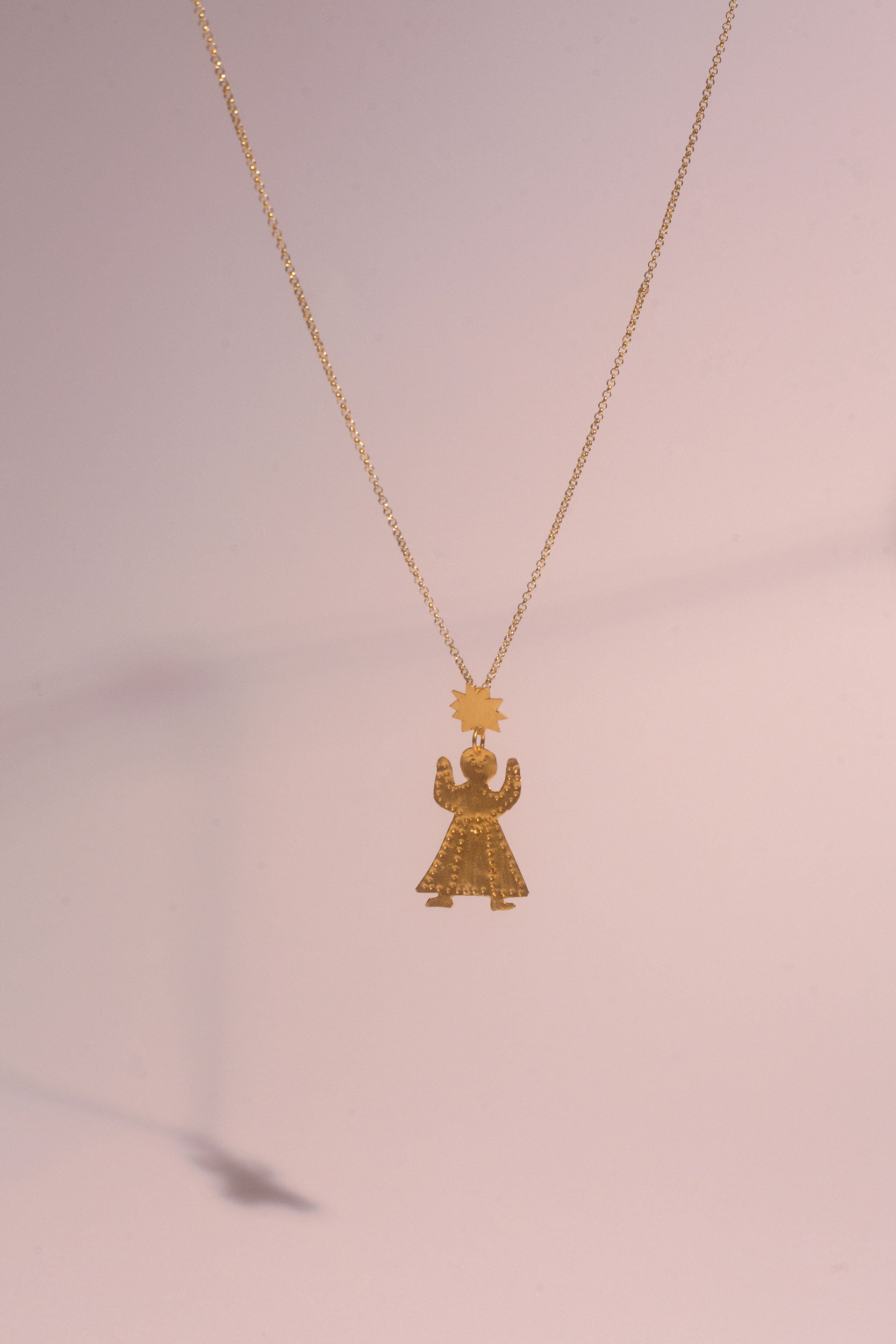 Tête de soleil pendant