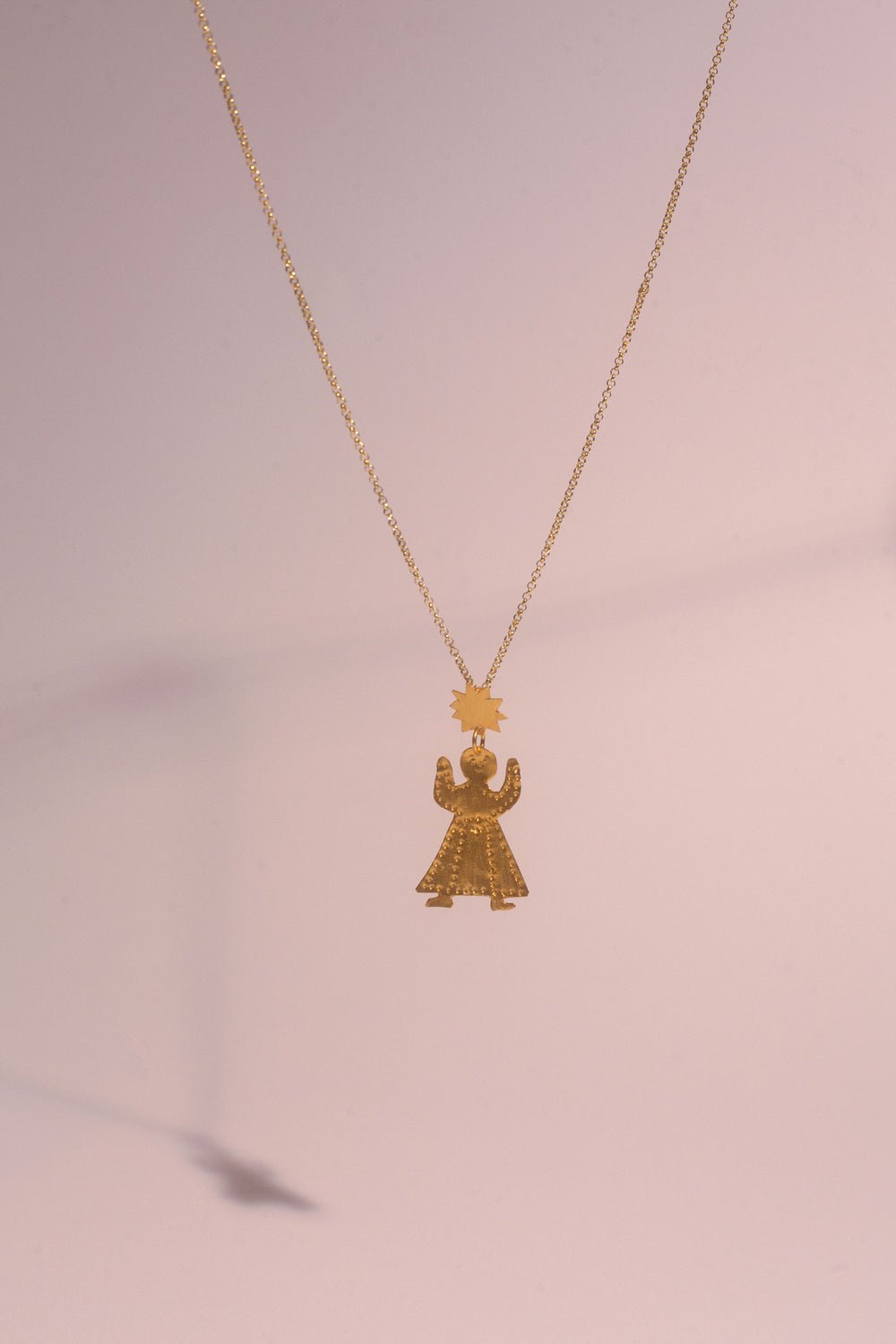 Tête de soleil pendant
