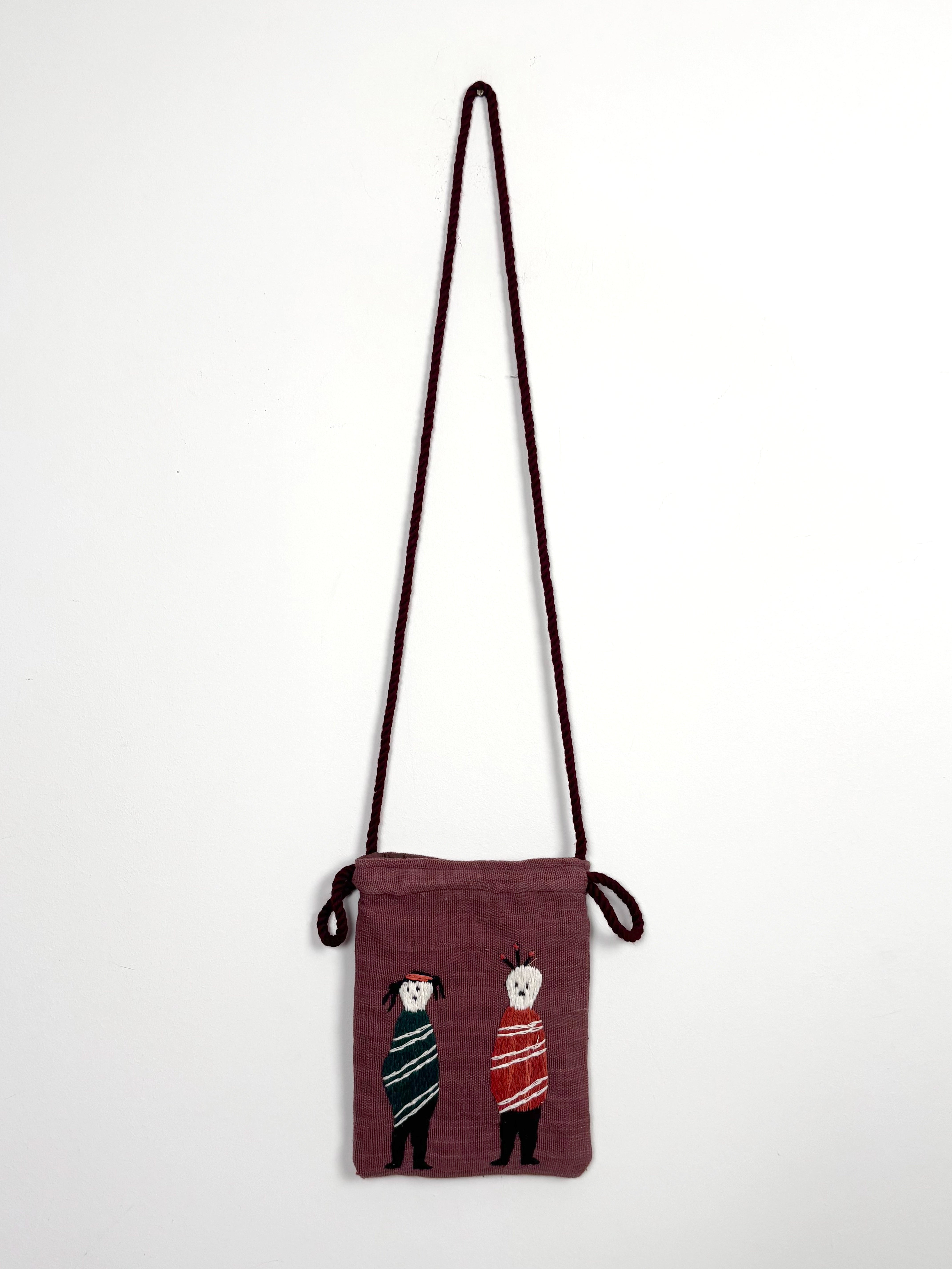 A couple scene pouch bag