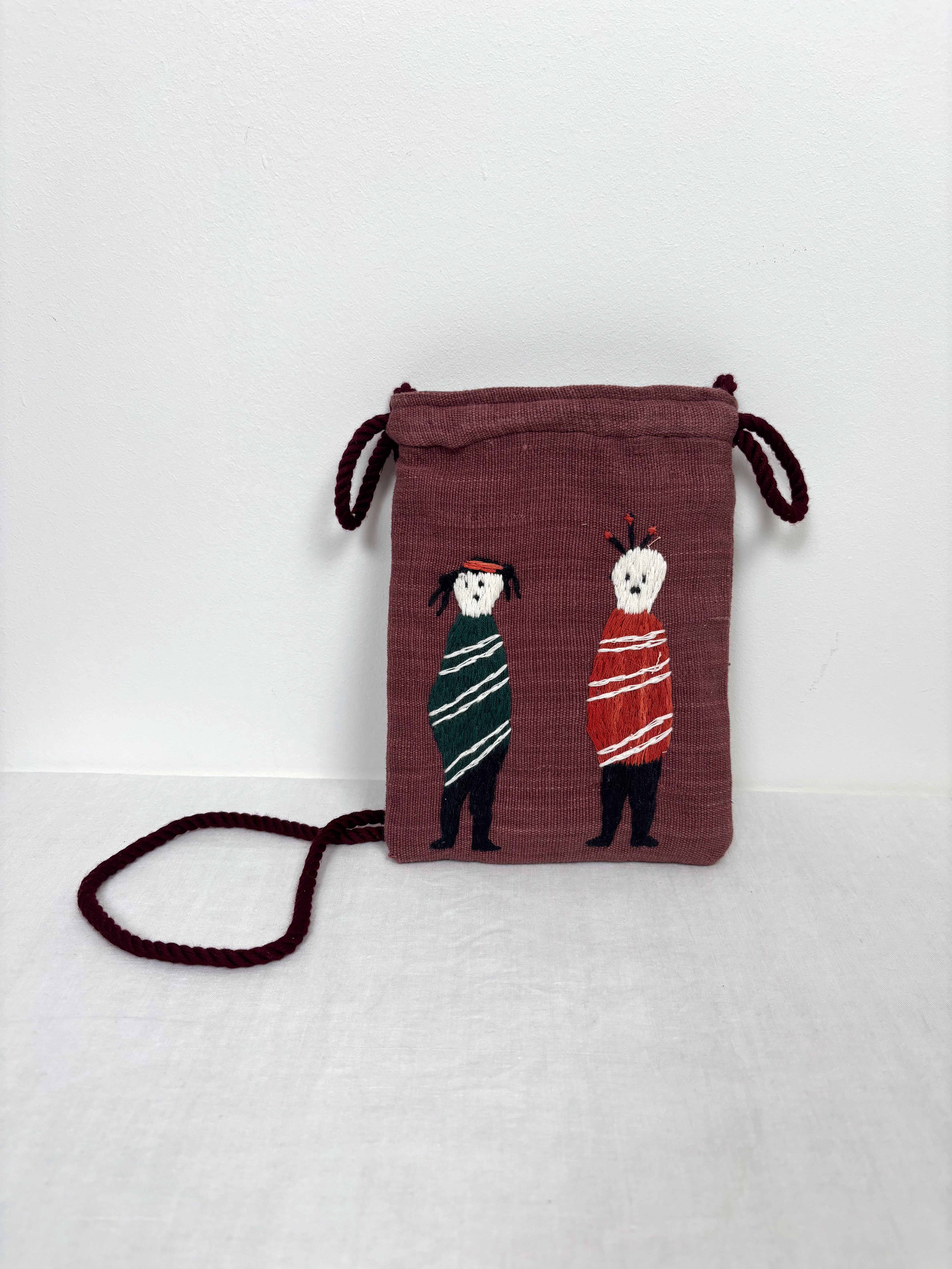 A couple scene pouch bag