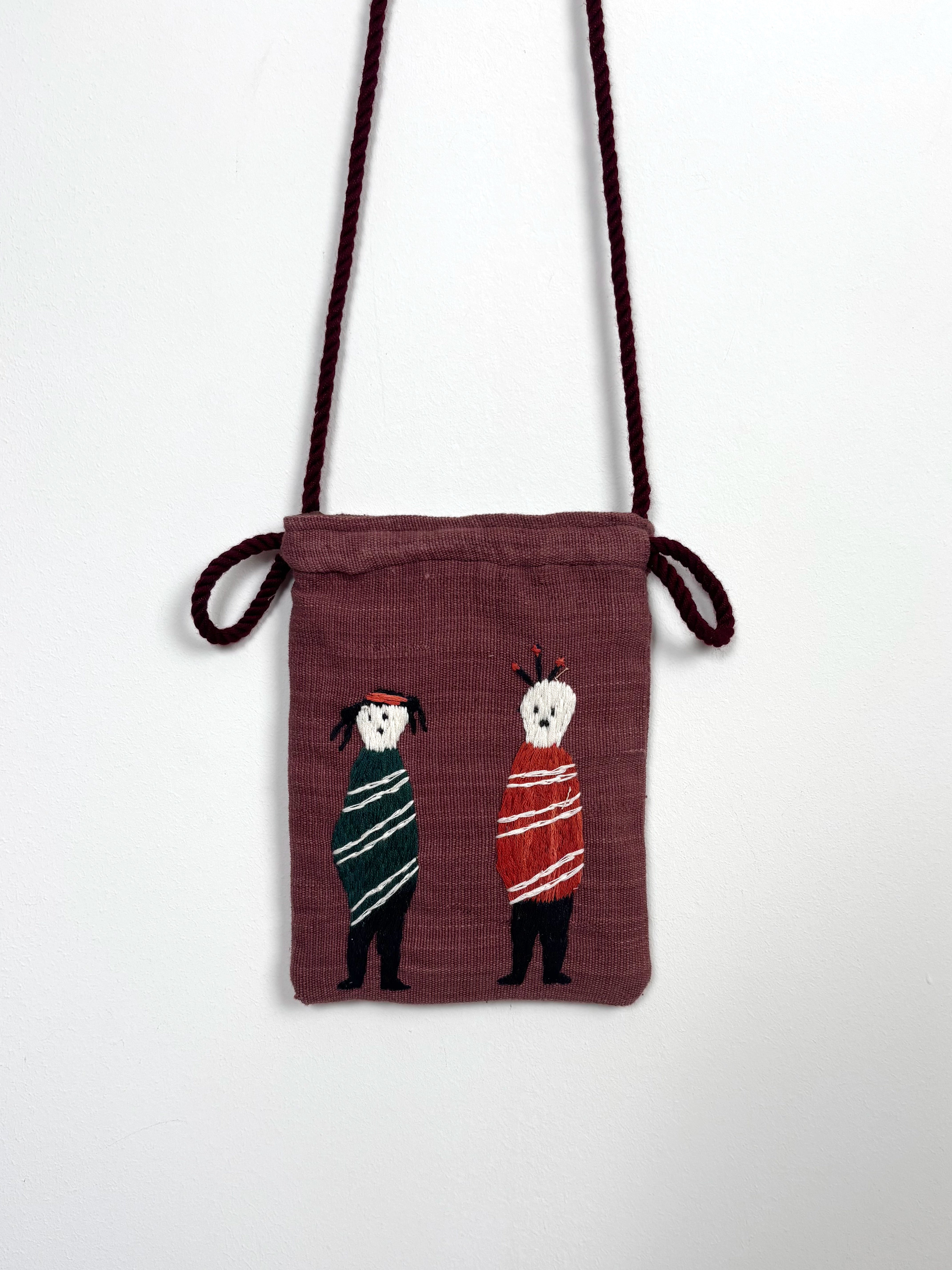 A couple scene pouch bag