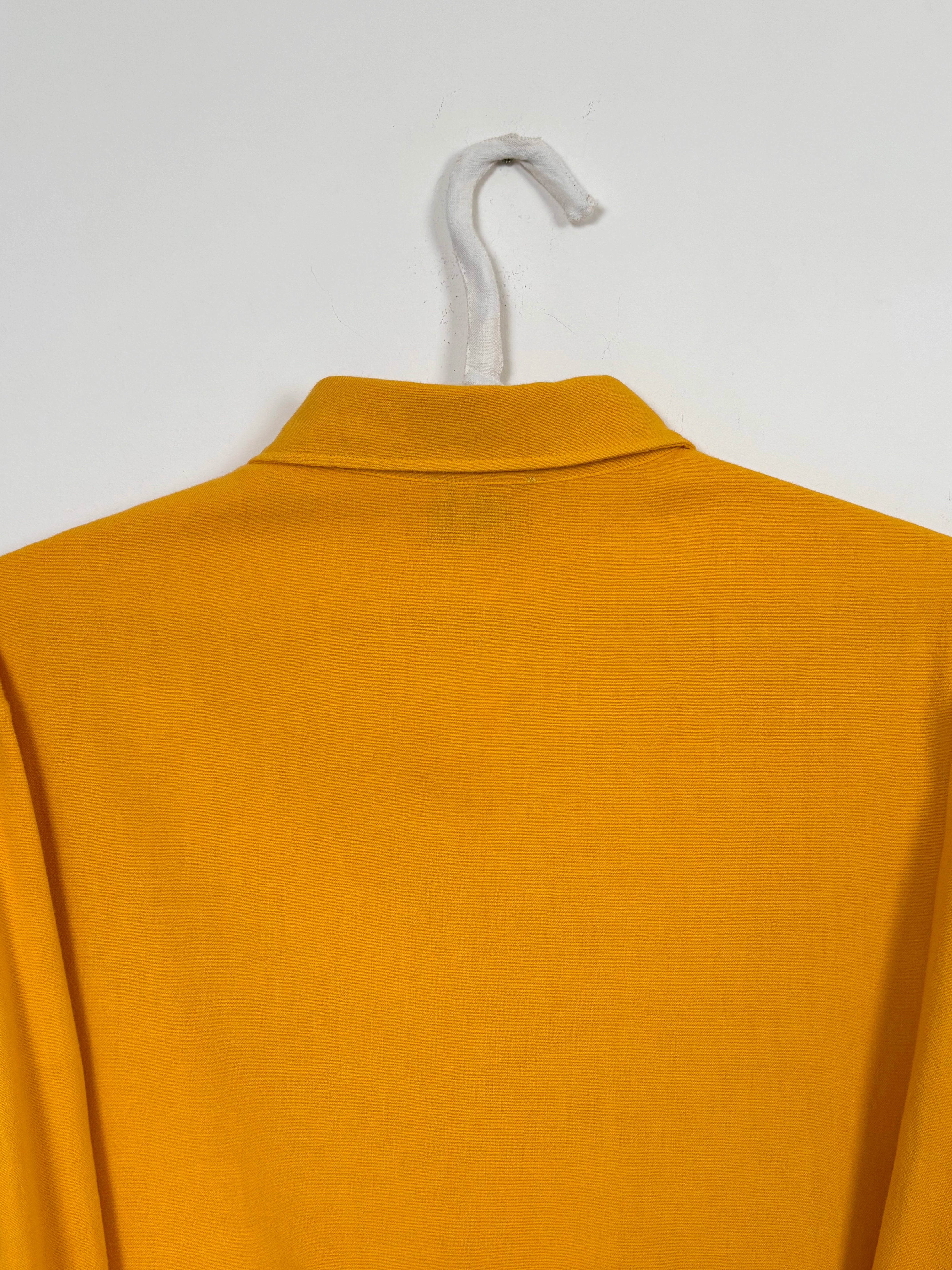 Vibrant yellow dyed shirt