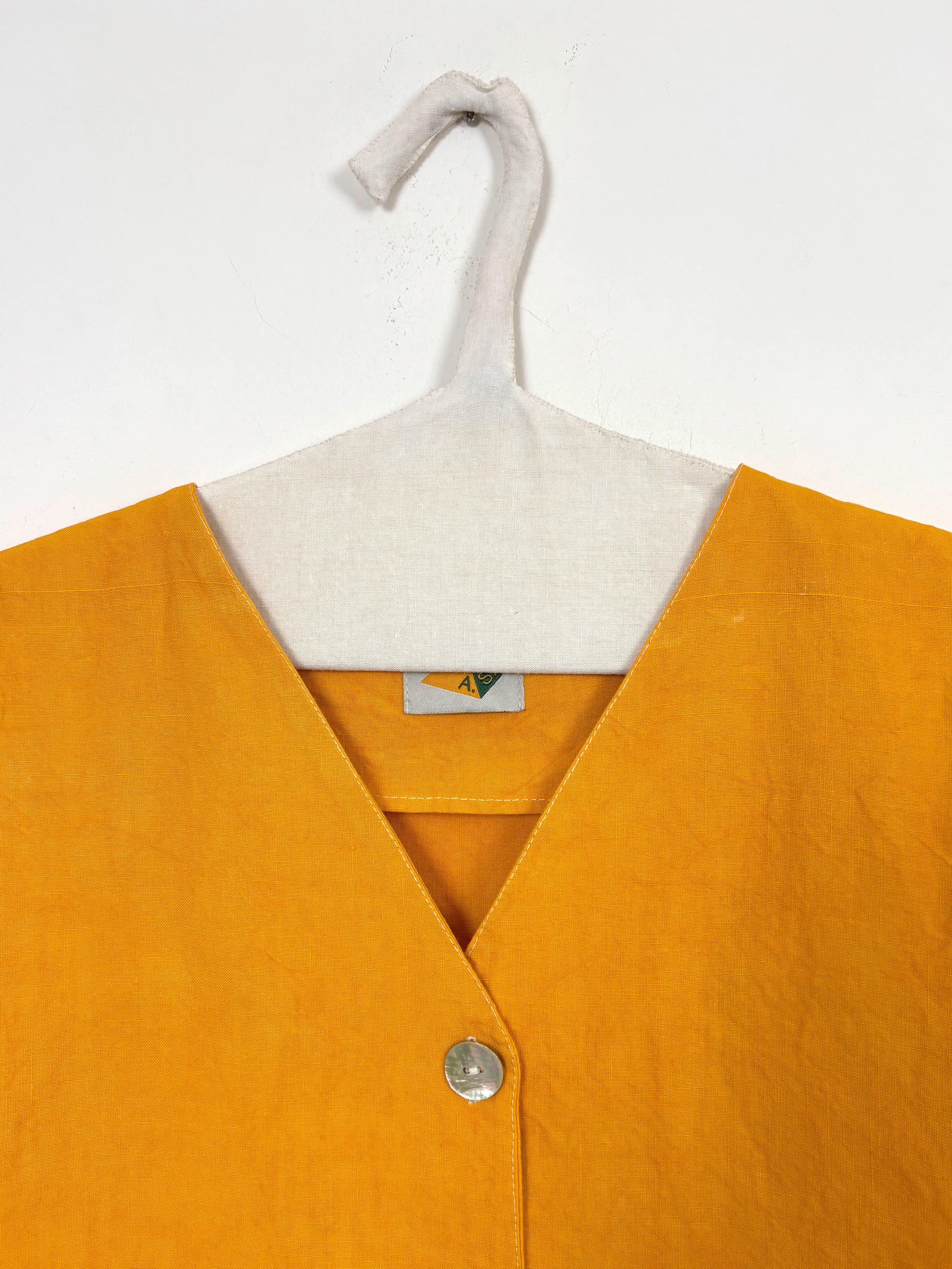 Vibrant yellow dyed vest