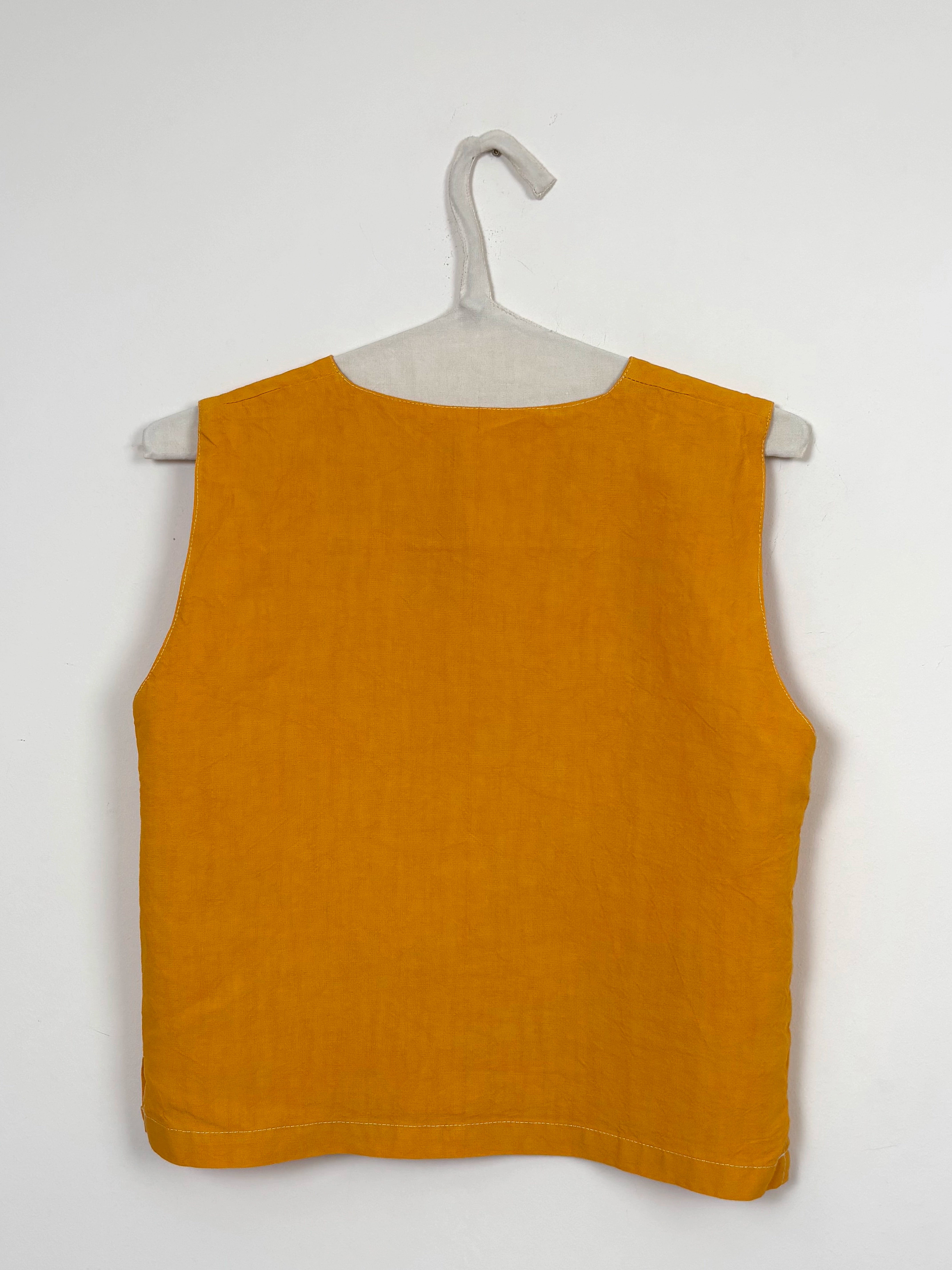 Vibrant yellow dyed vest
