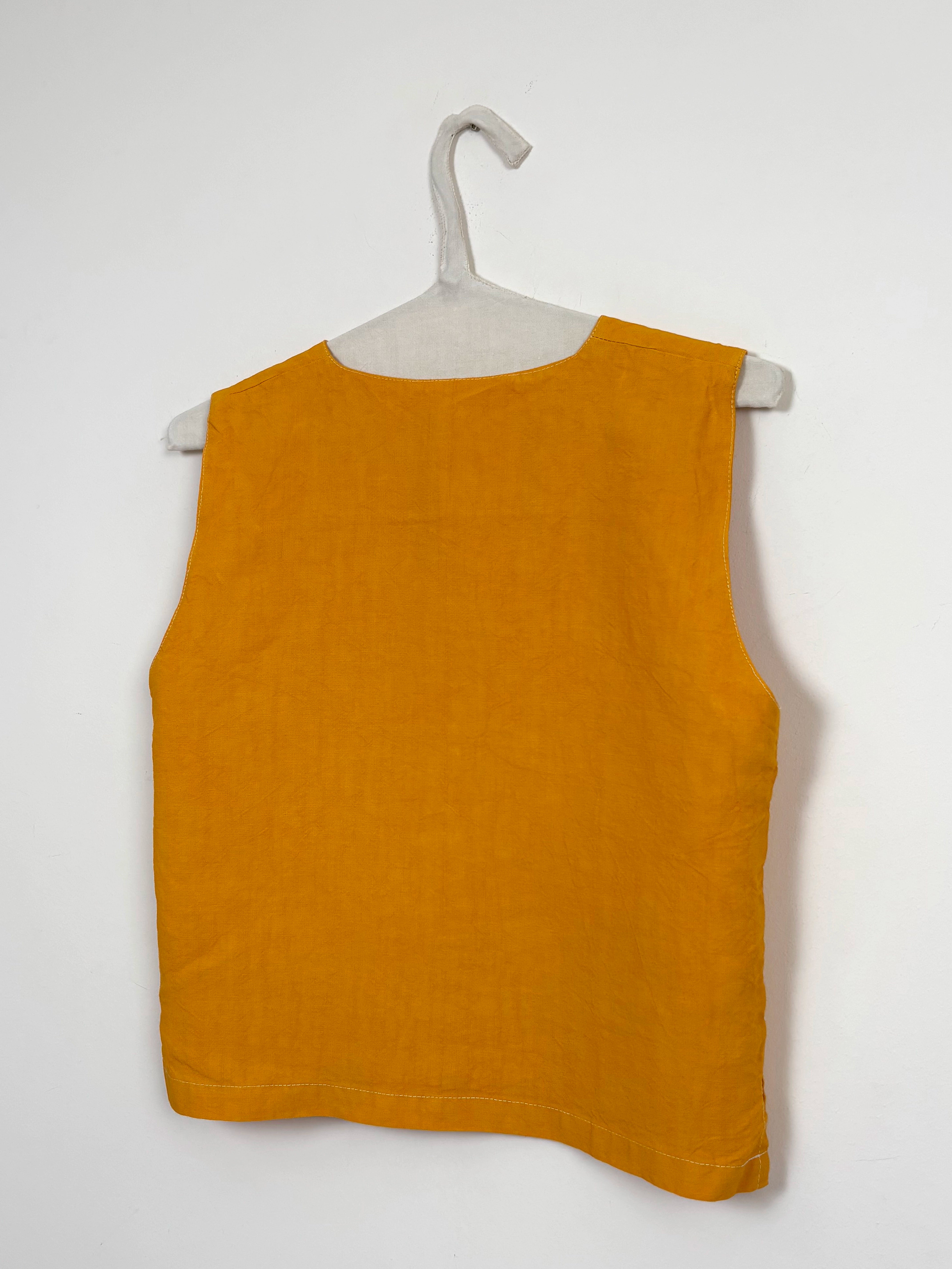 Vibrant yellow dyed vest