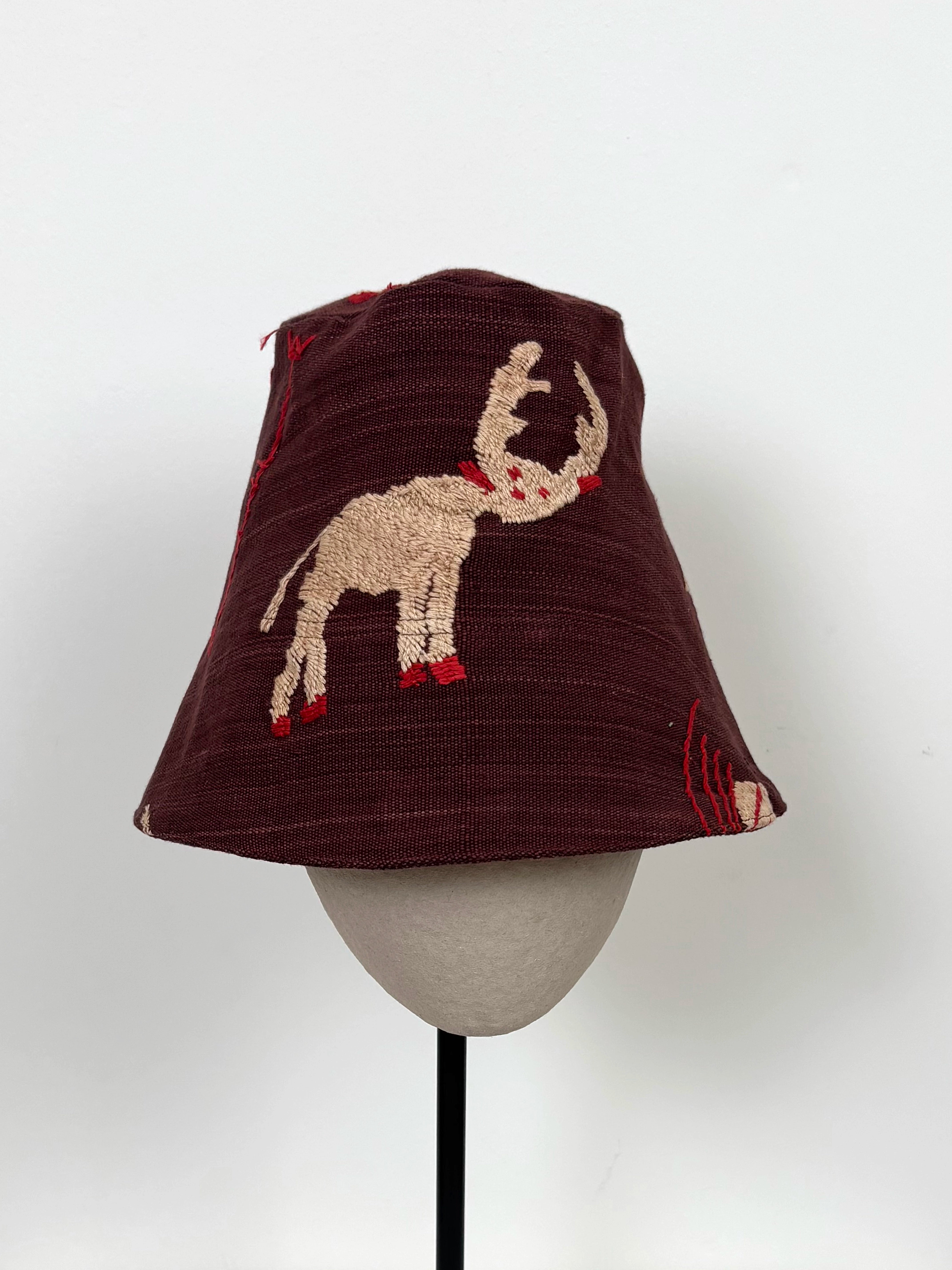 White reindeer scene hat