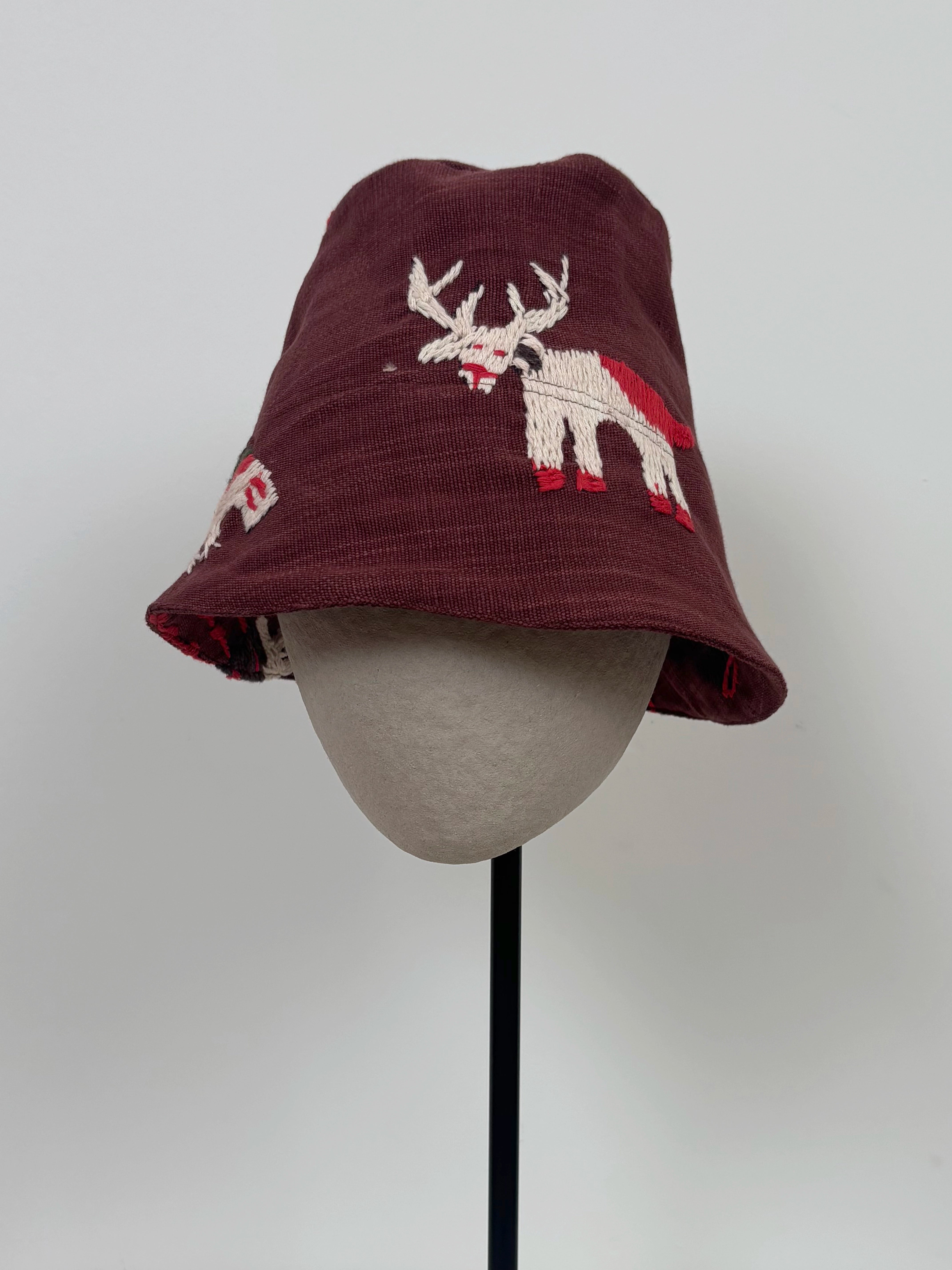 White goat scene hat