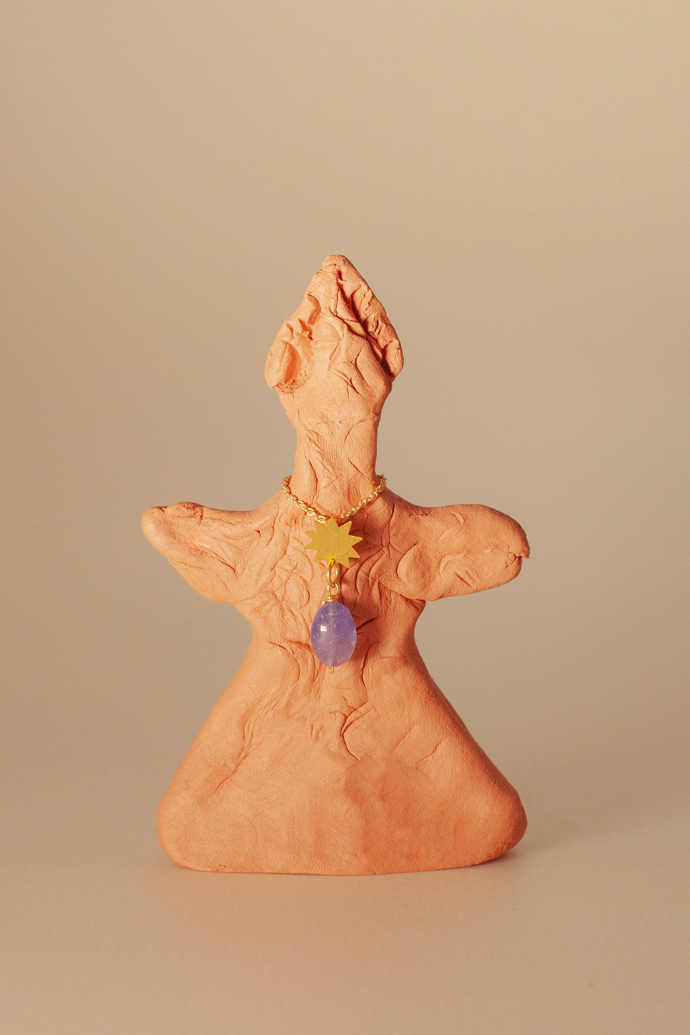 Faro gold pendant