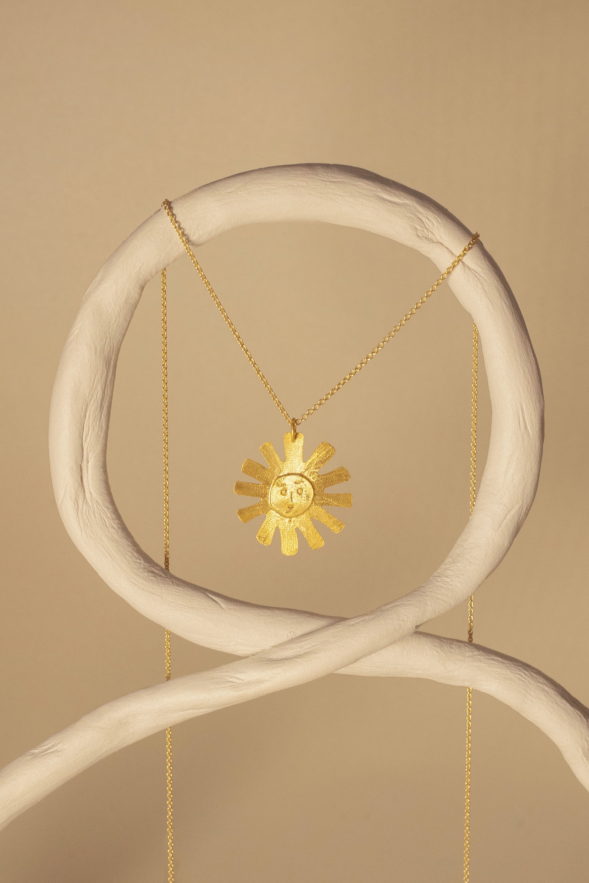 Luz gold pendant