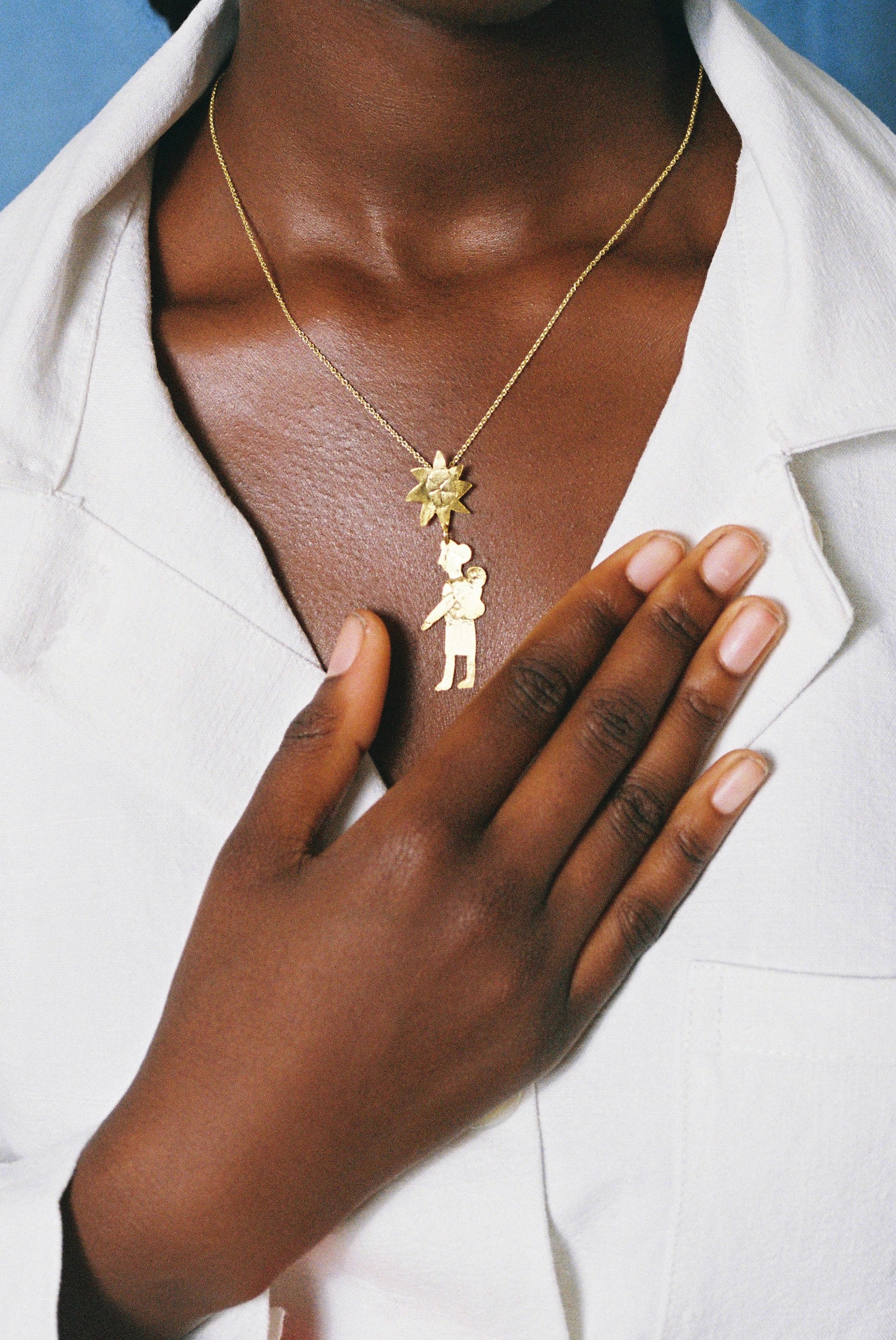Mater gold pendant
