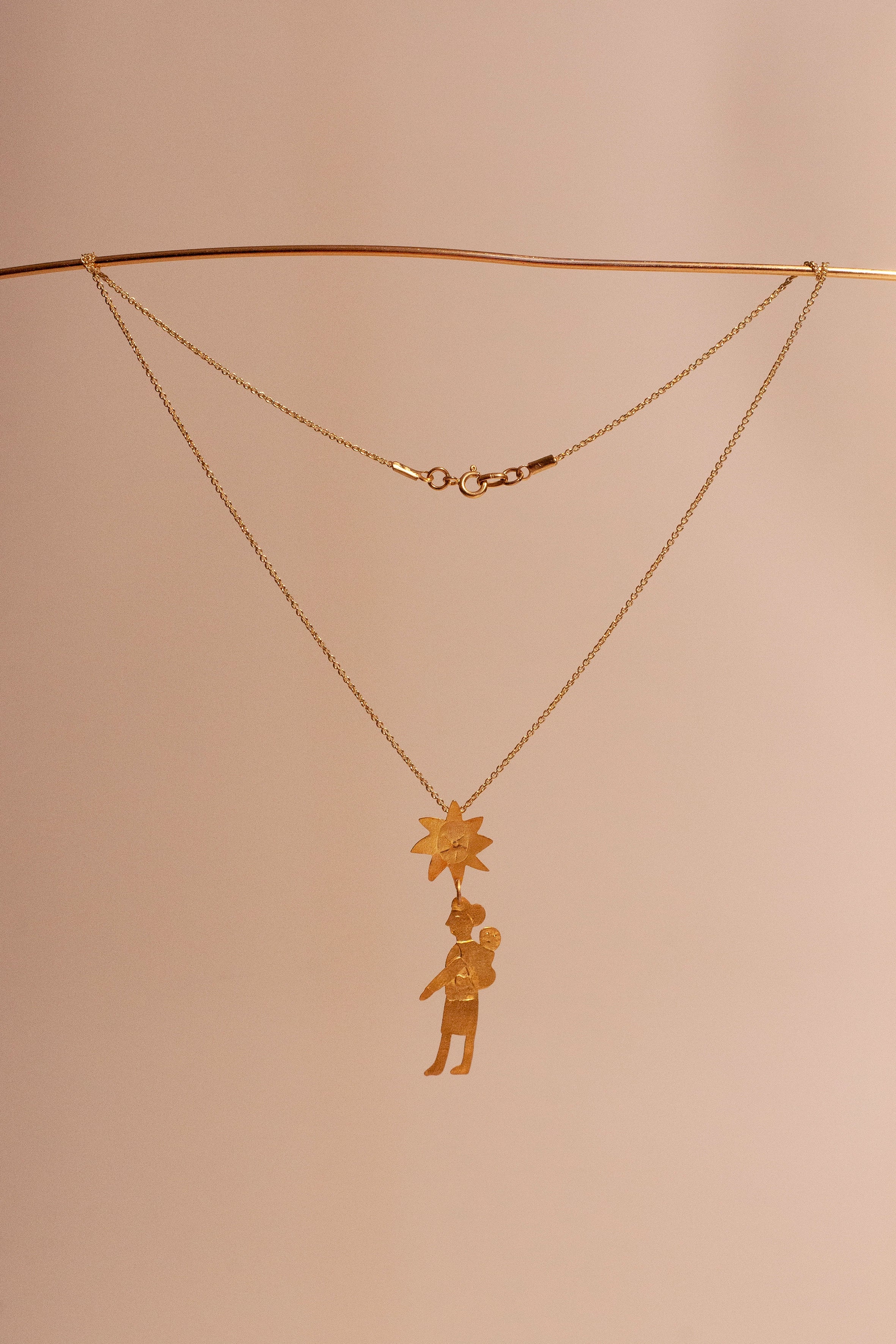 Mater gold pendant