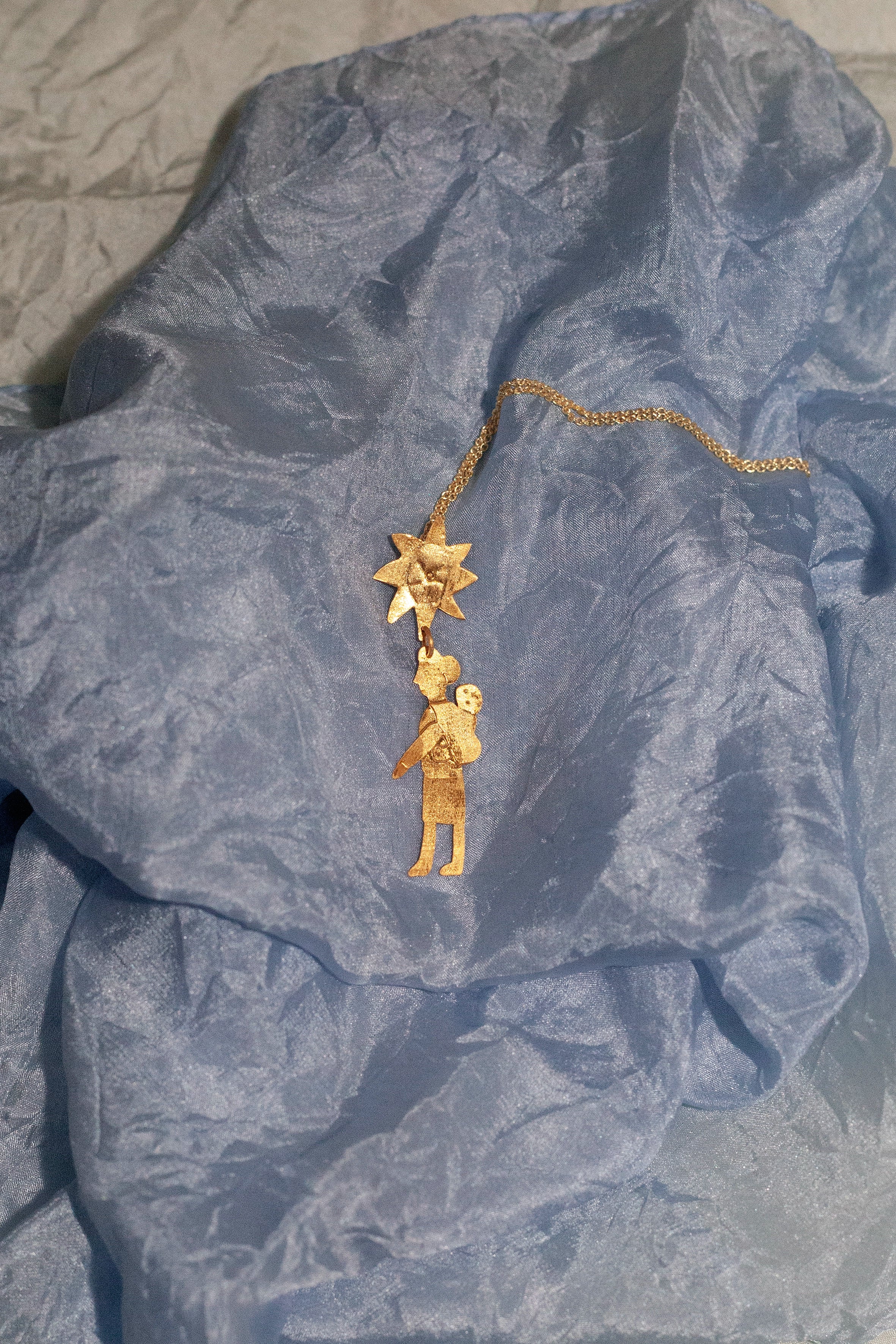 Mater gold pendant