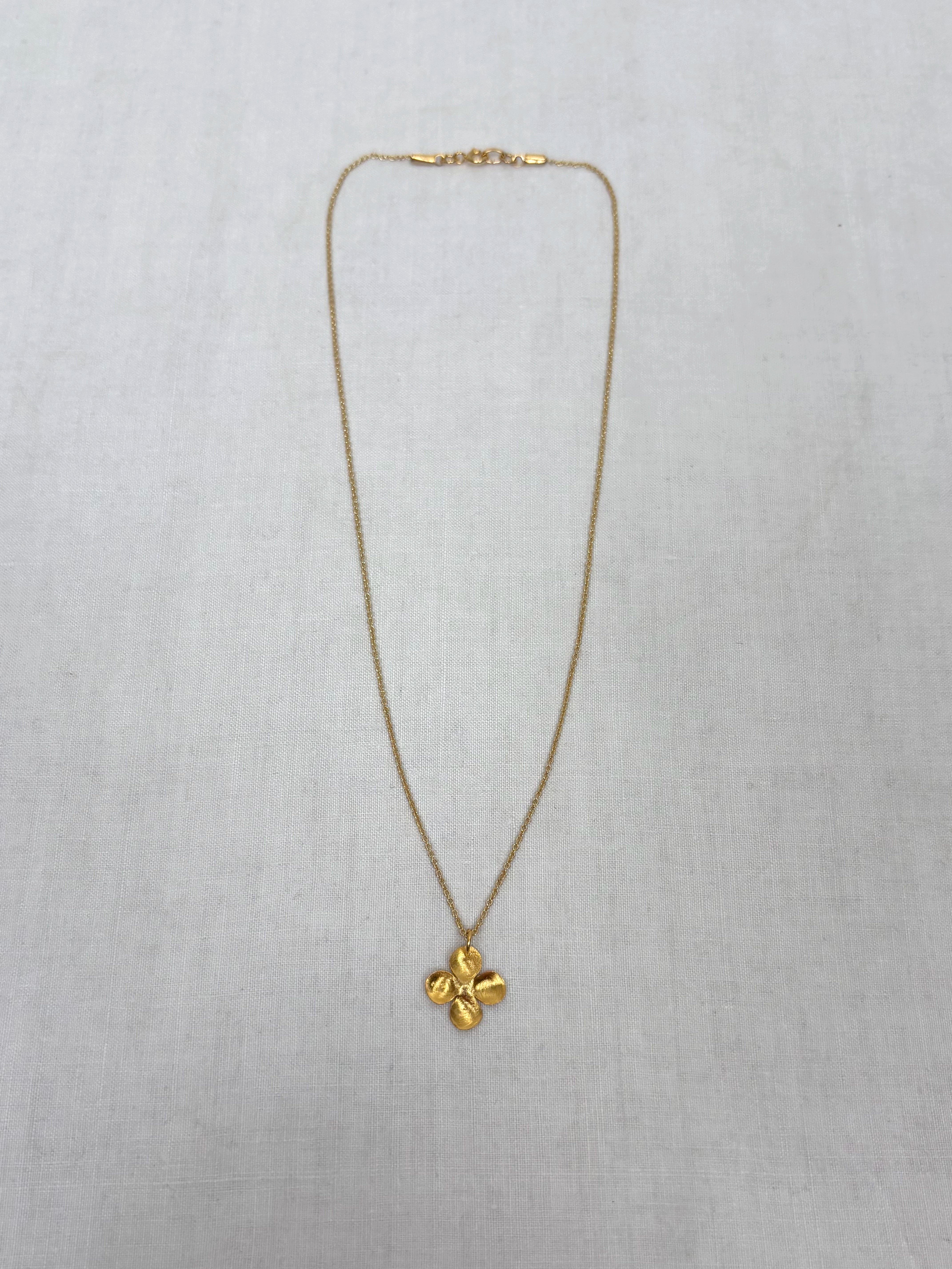 Alba M gold pendant