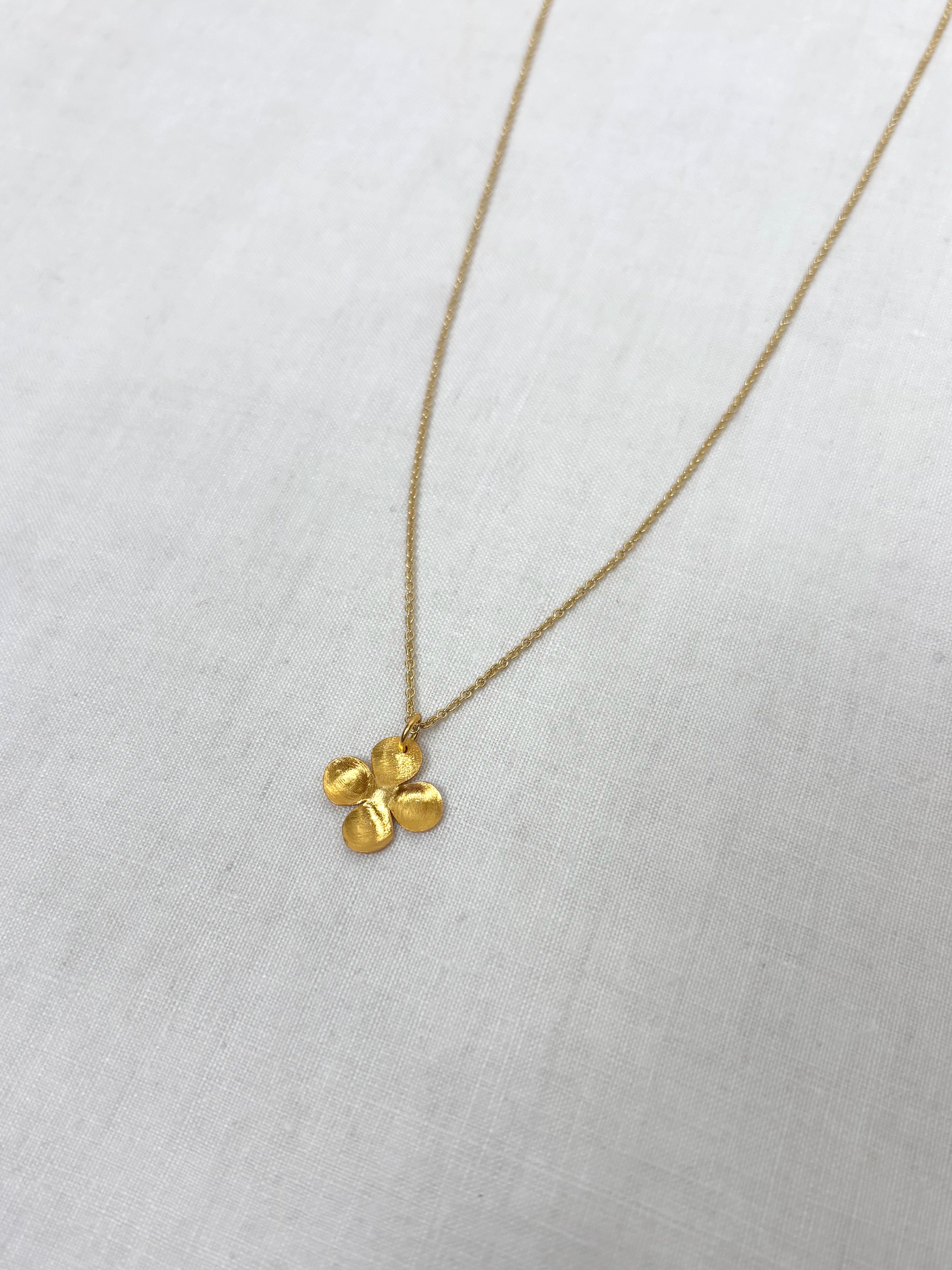 Alba M gold pendant