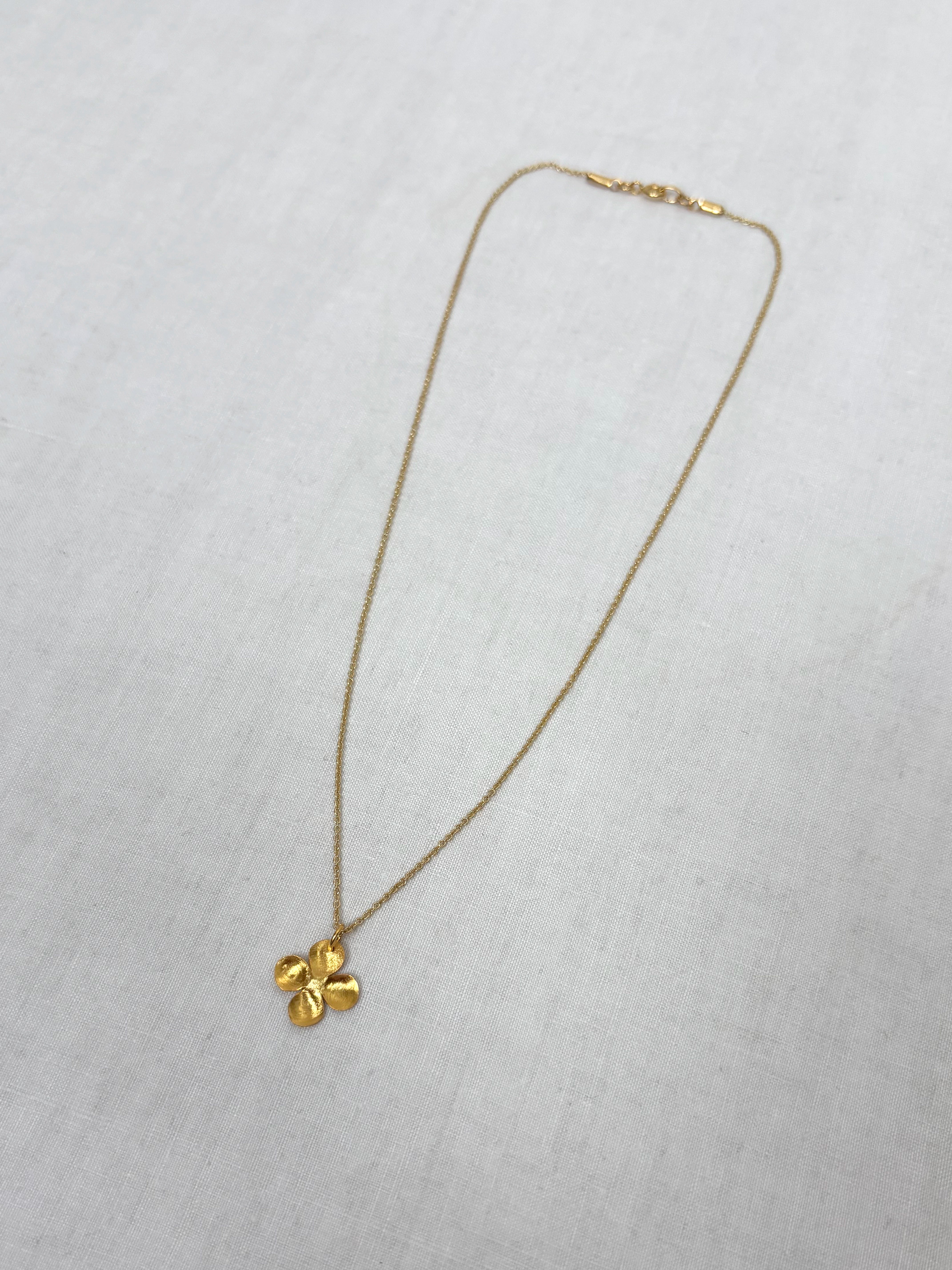 Alba M gold pendant