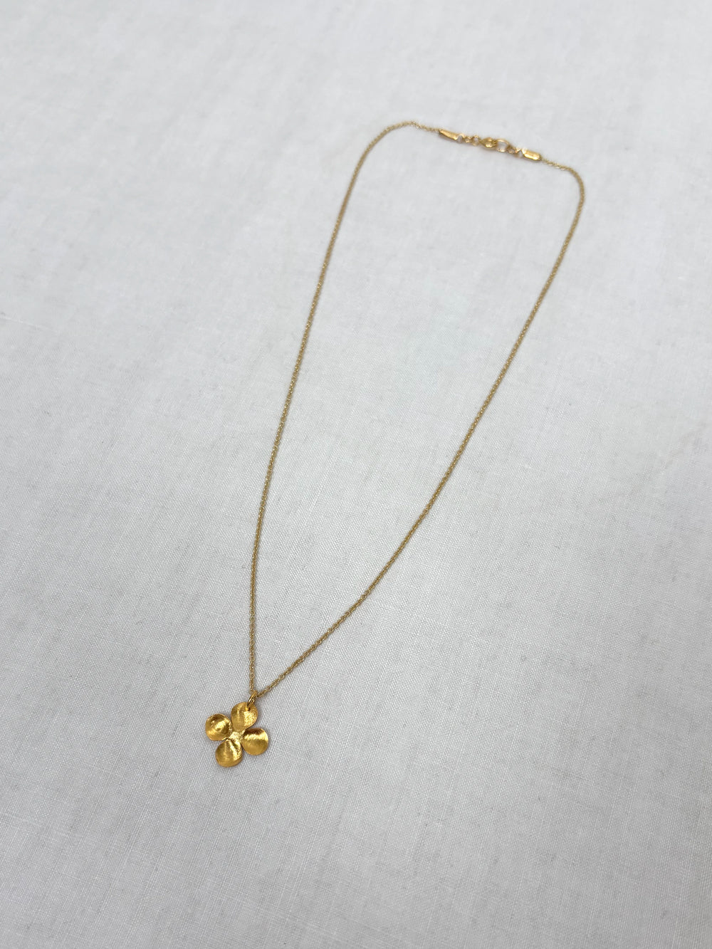 Alba M gold pendant