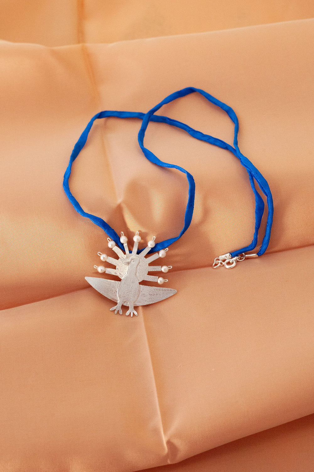 Ocelo silver silk necklace