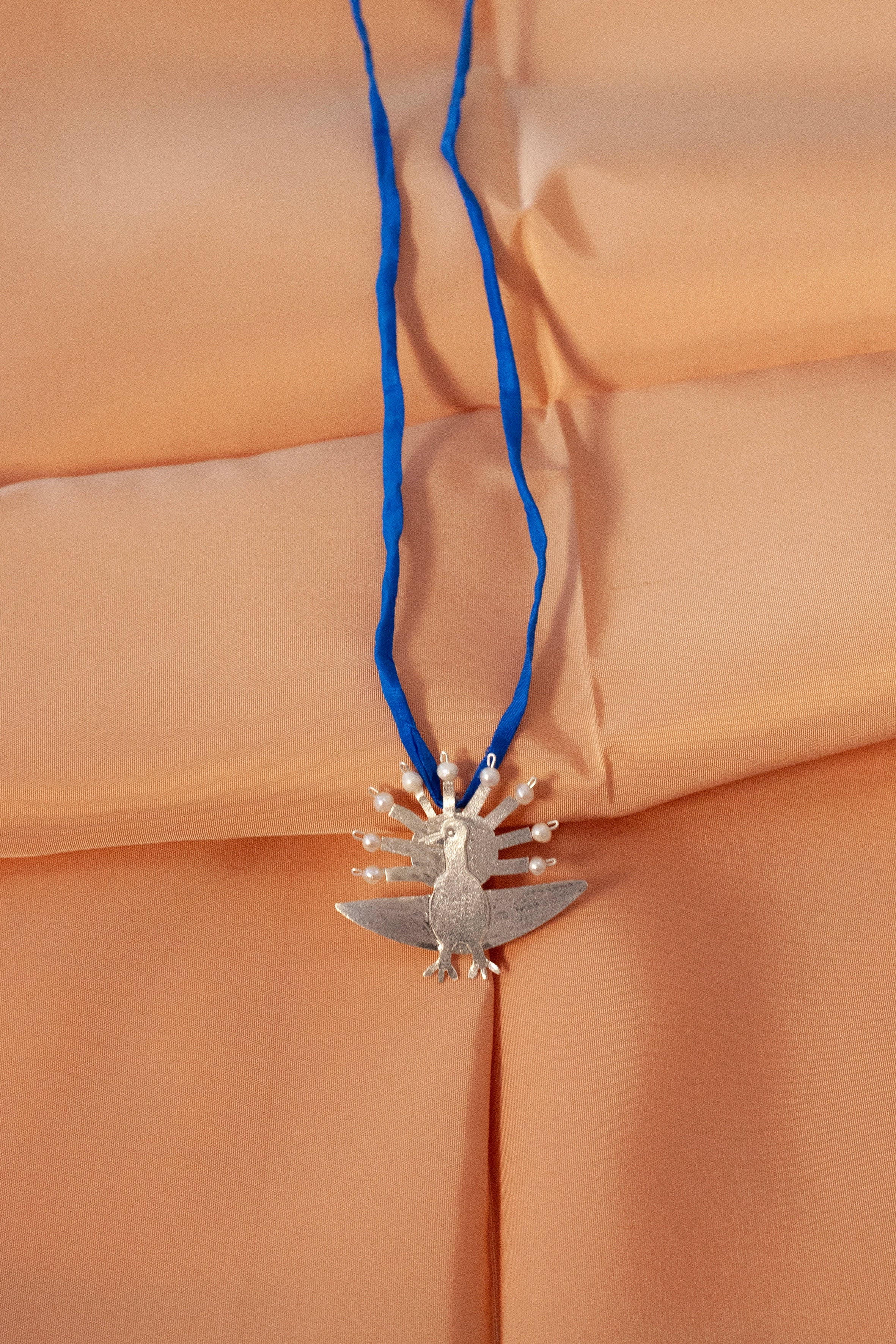 Ocelo silver silk necklace