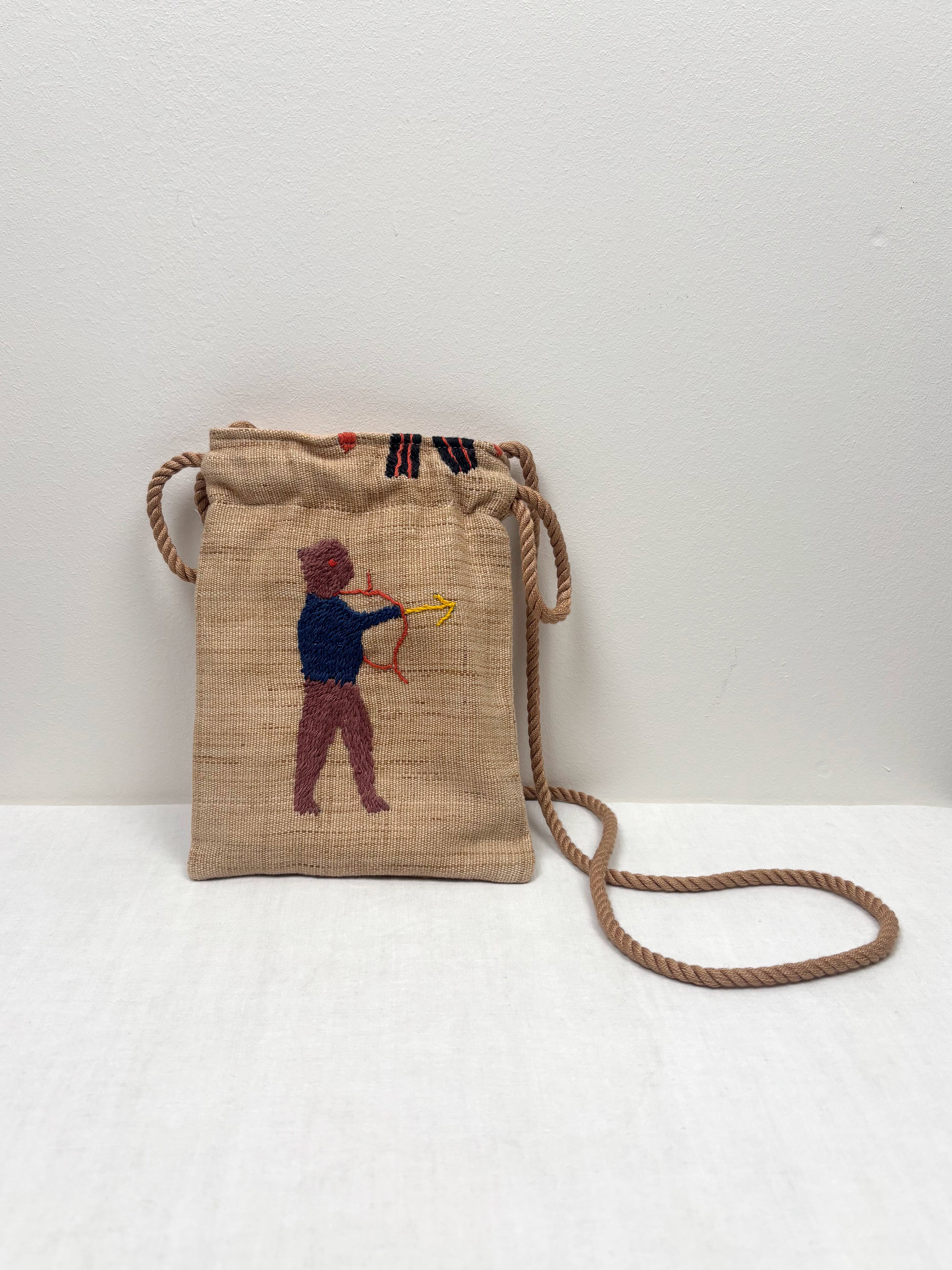 Boy with a bow scene pouch bag