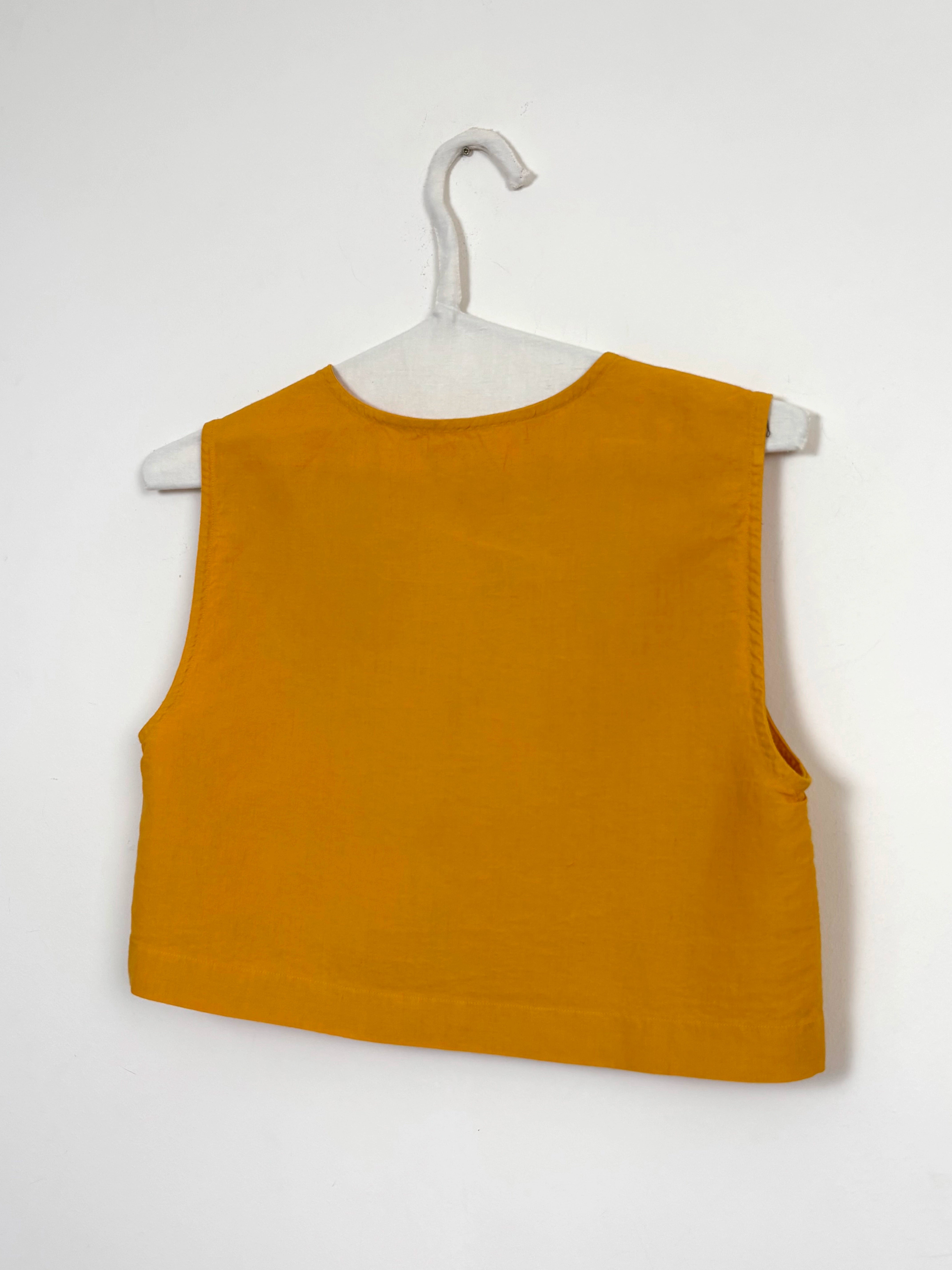 Vibrant yellow dyed top with bows